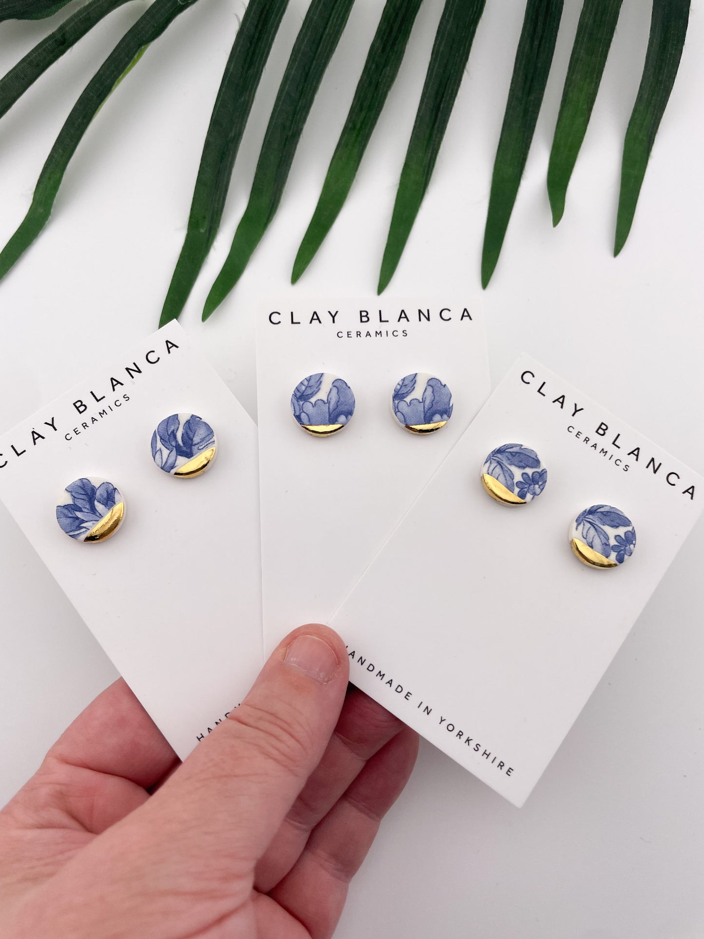 Vintage china - blue round studs with gold tips