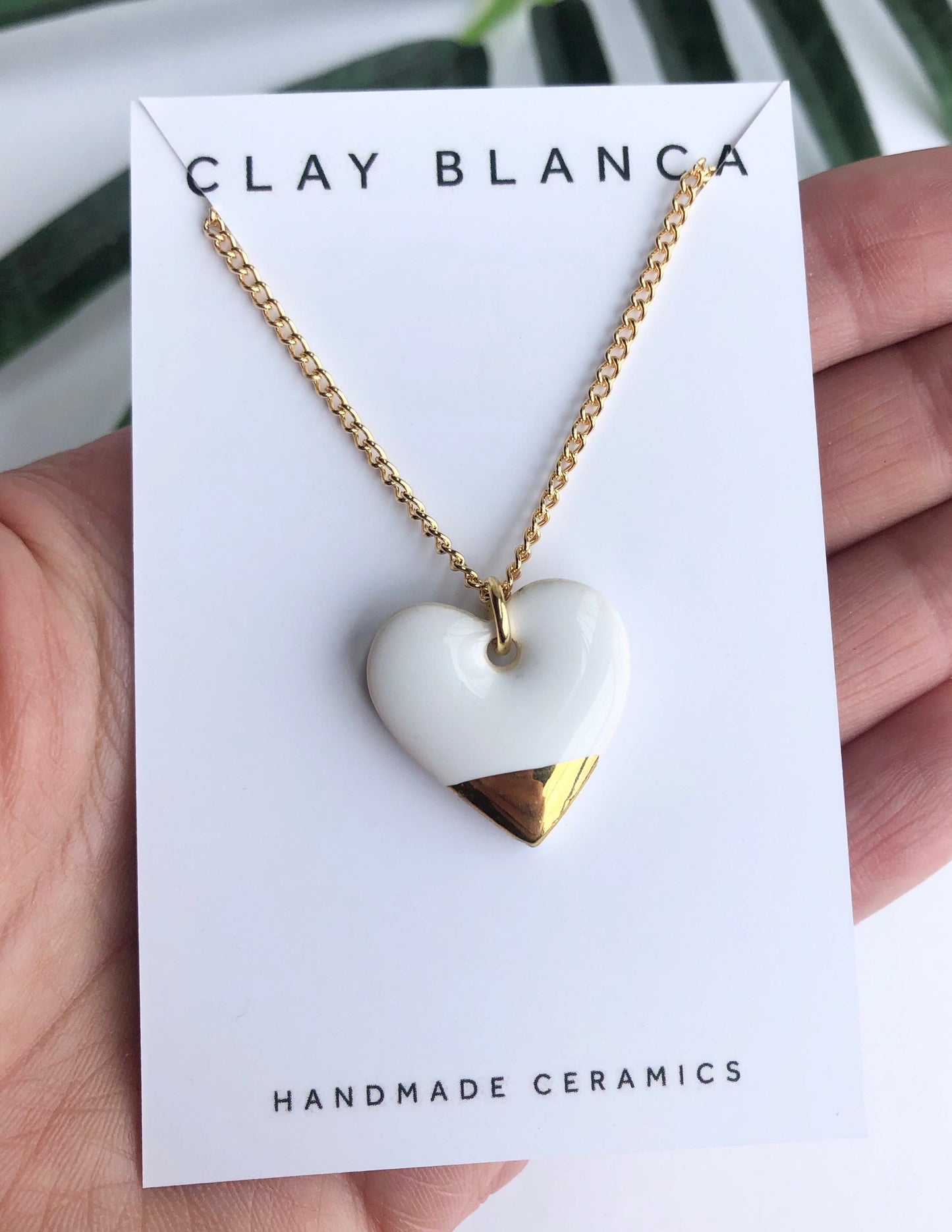White large heart necklace with gold tip
