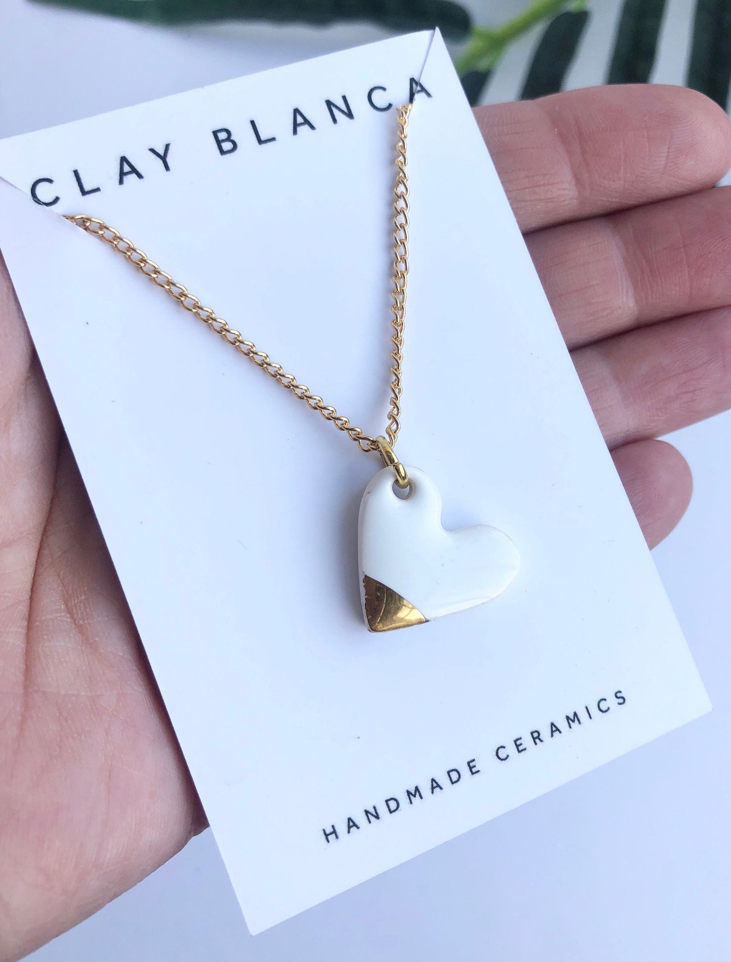 White small heart necklace with gold tip
