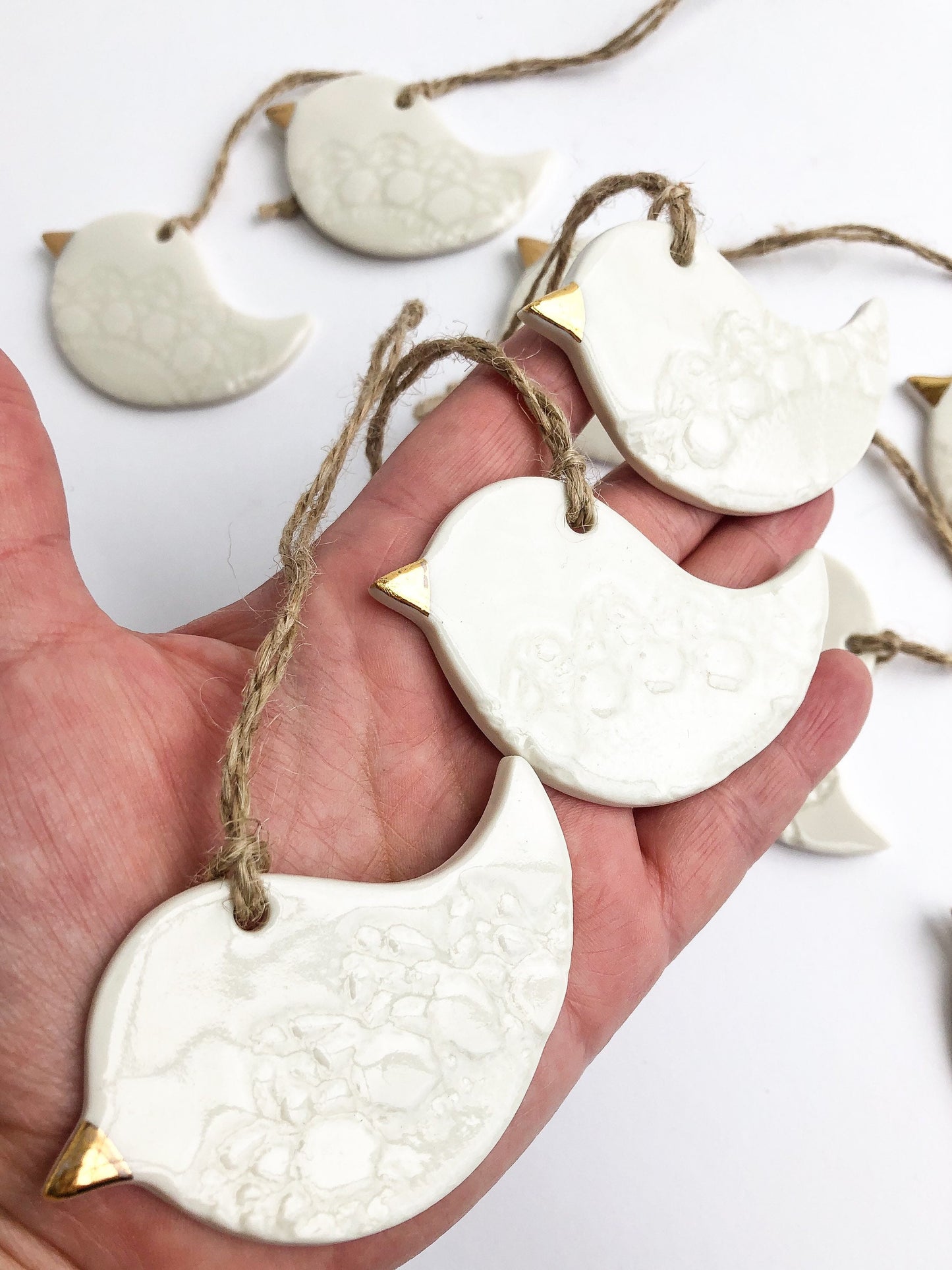 White bird with lace imprint ornament