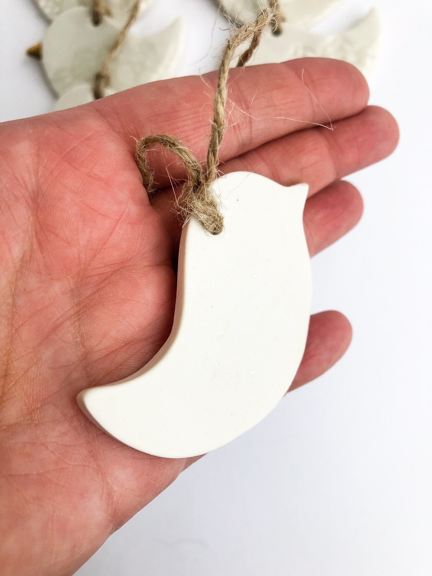 White bird with lace imprint ornament