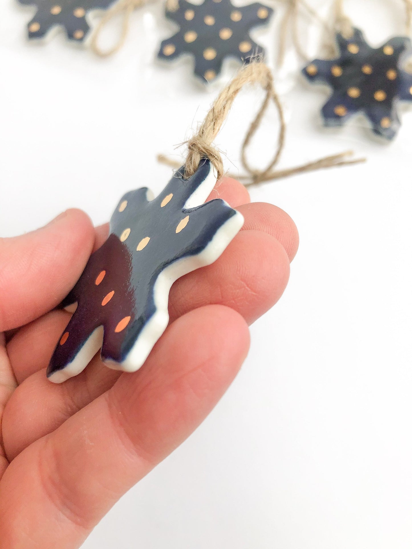 Ultramarine snowflake gift tag with gold dots