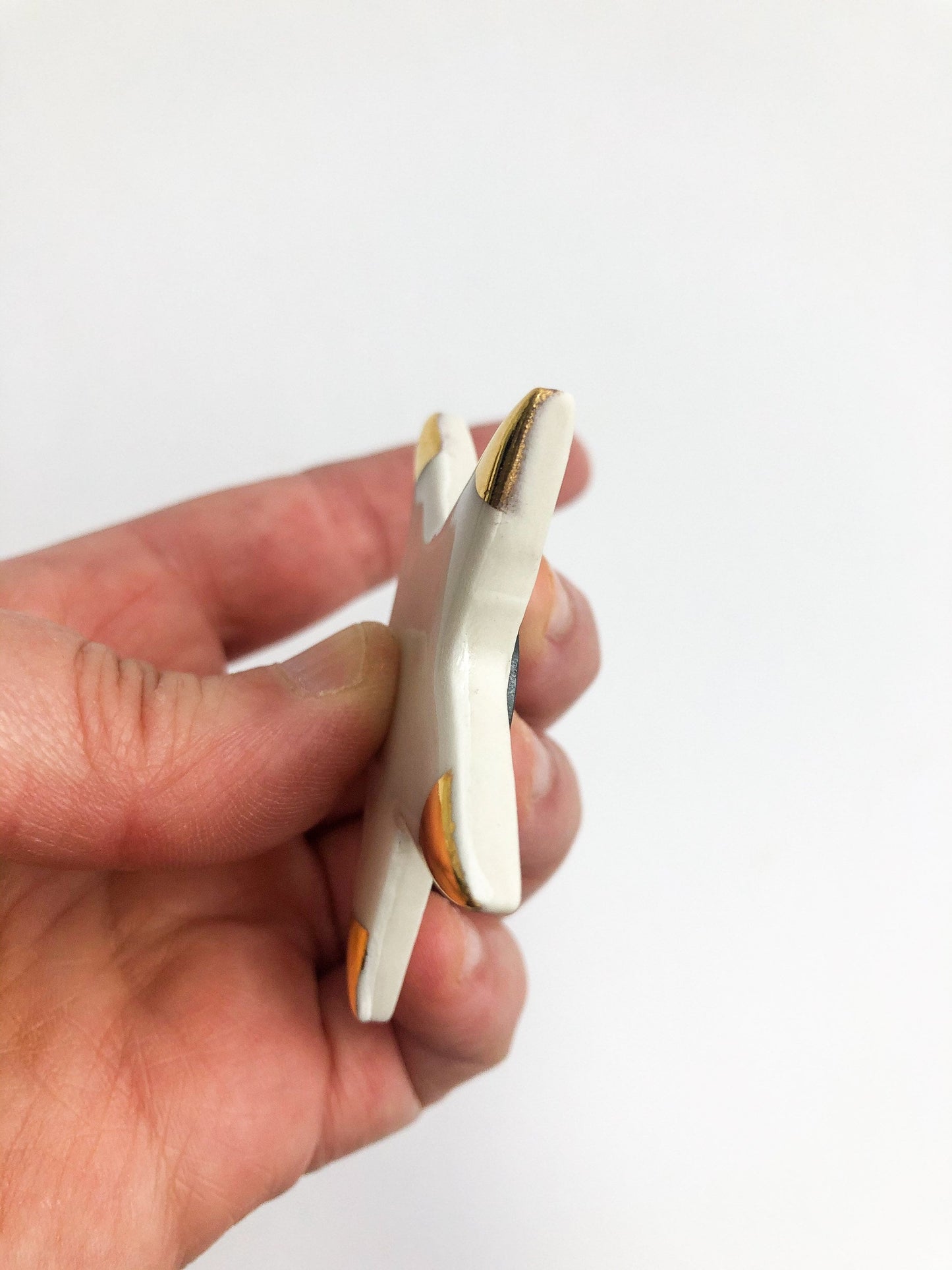 Magnet white star with gold tips