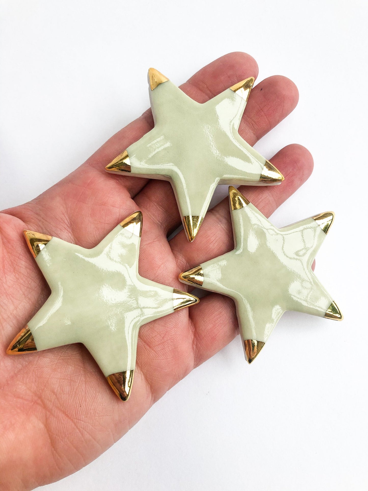 Magnet green star with gold tips