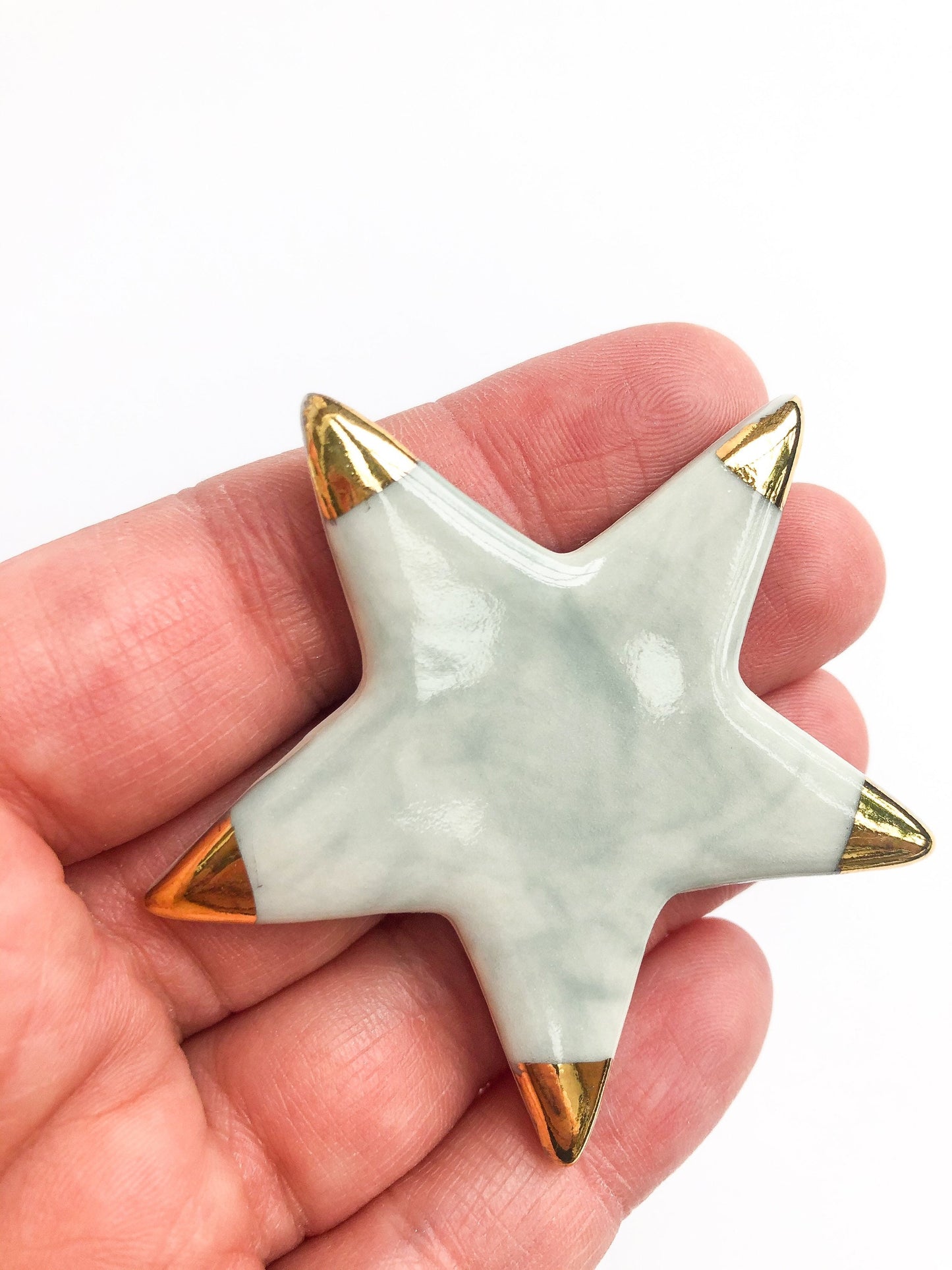 Magnet grey star with gold tips
