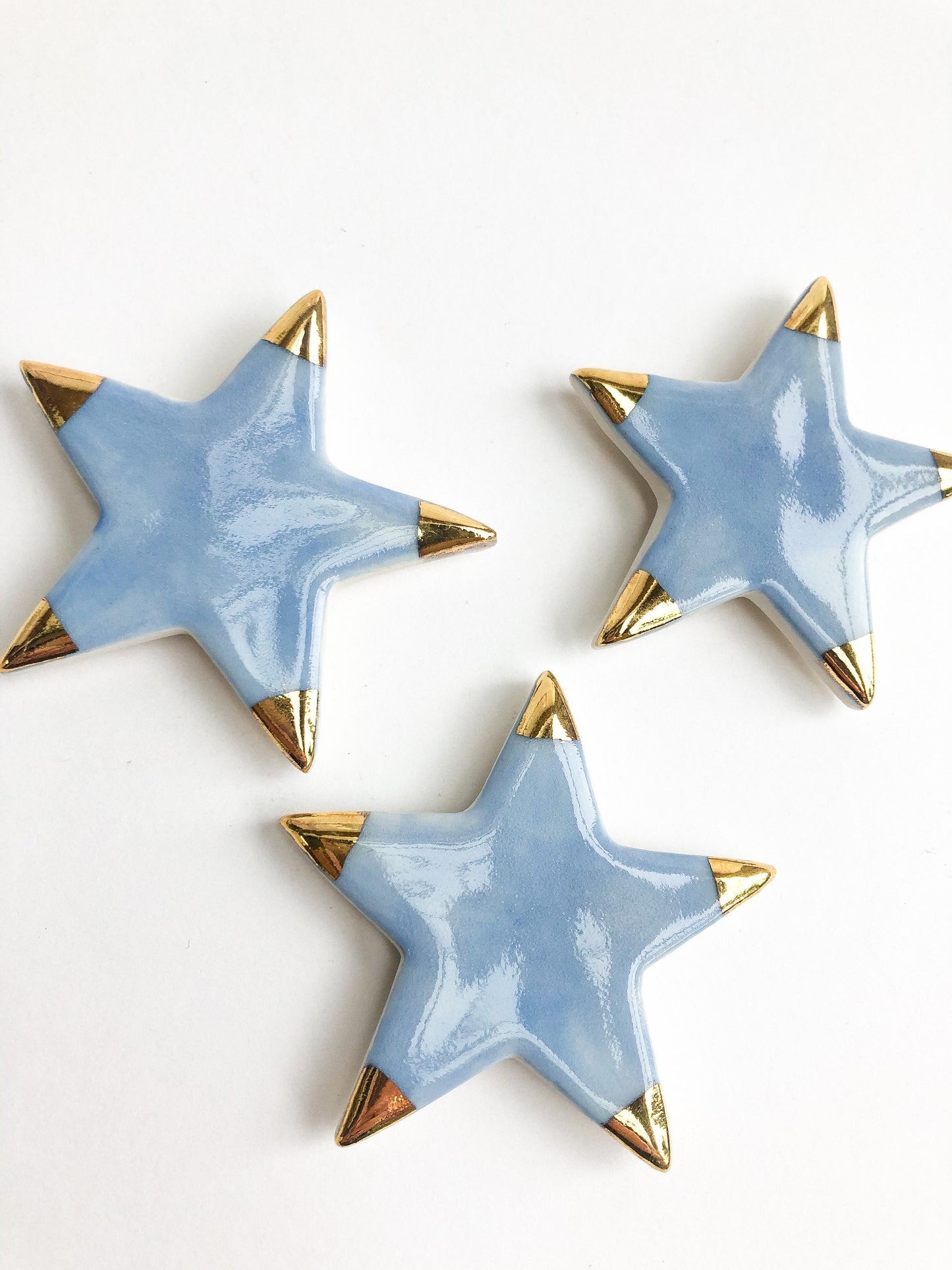 Magnet sky blue star with gold tips