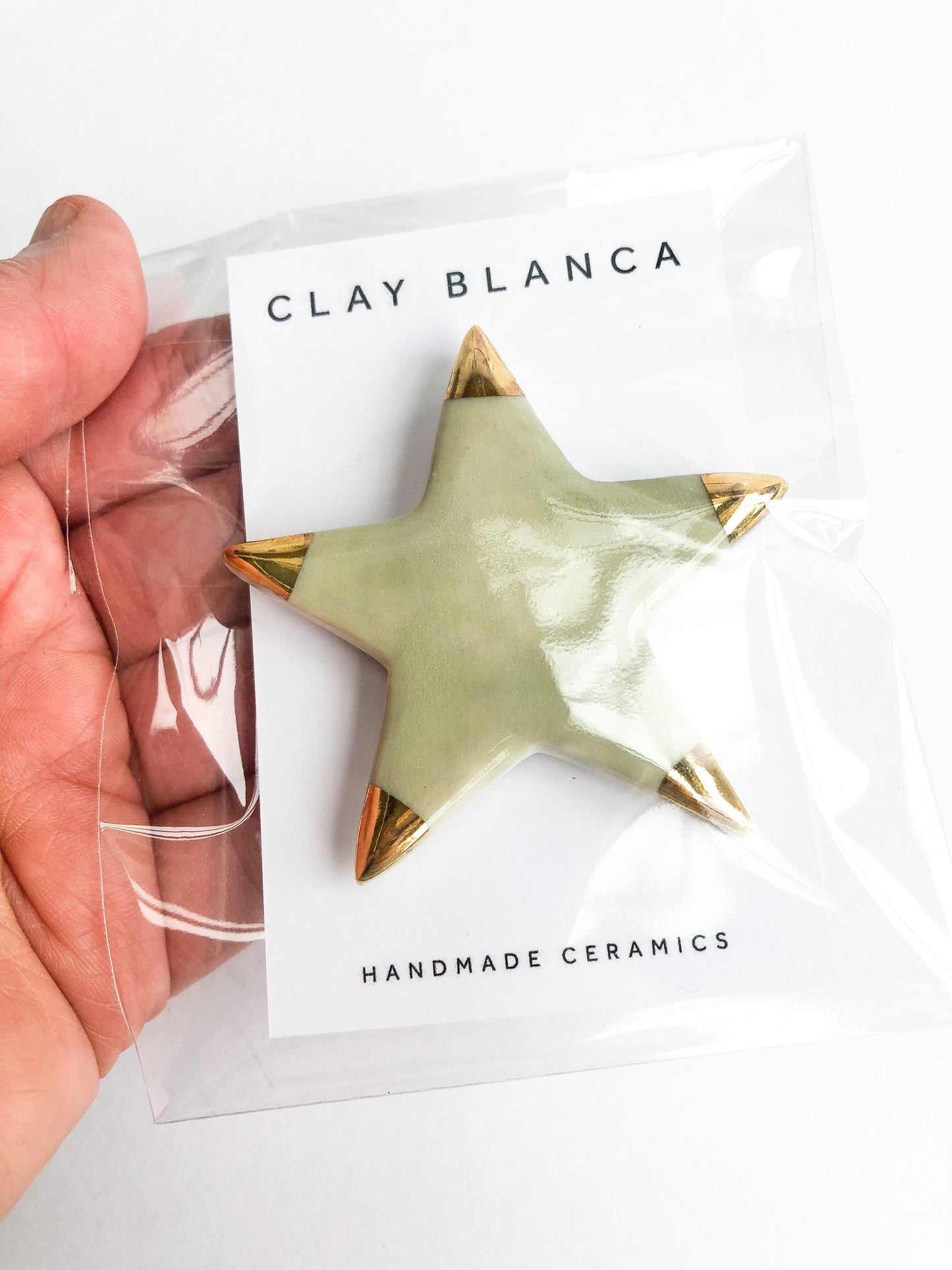 Magnet green star with gold tips