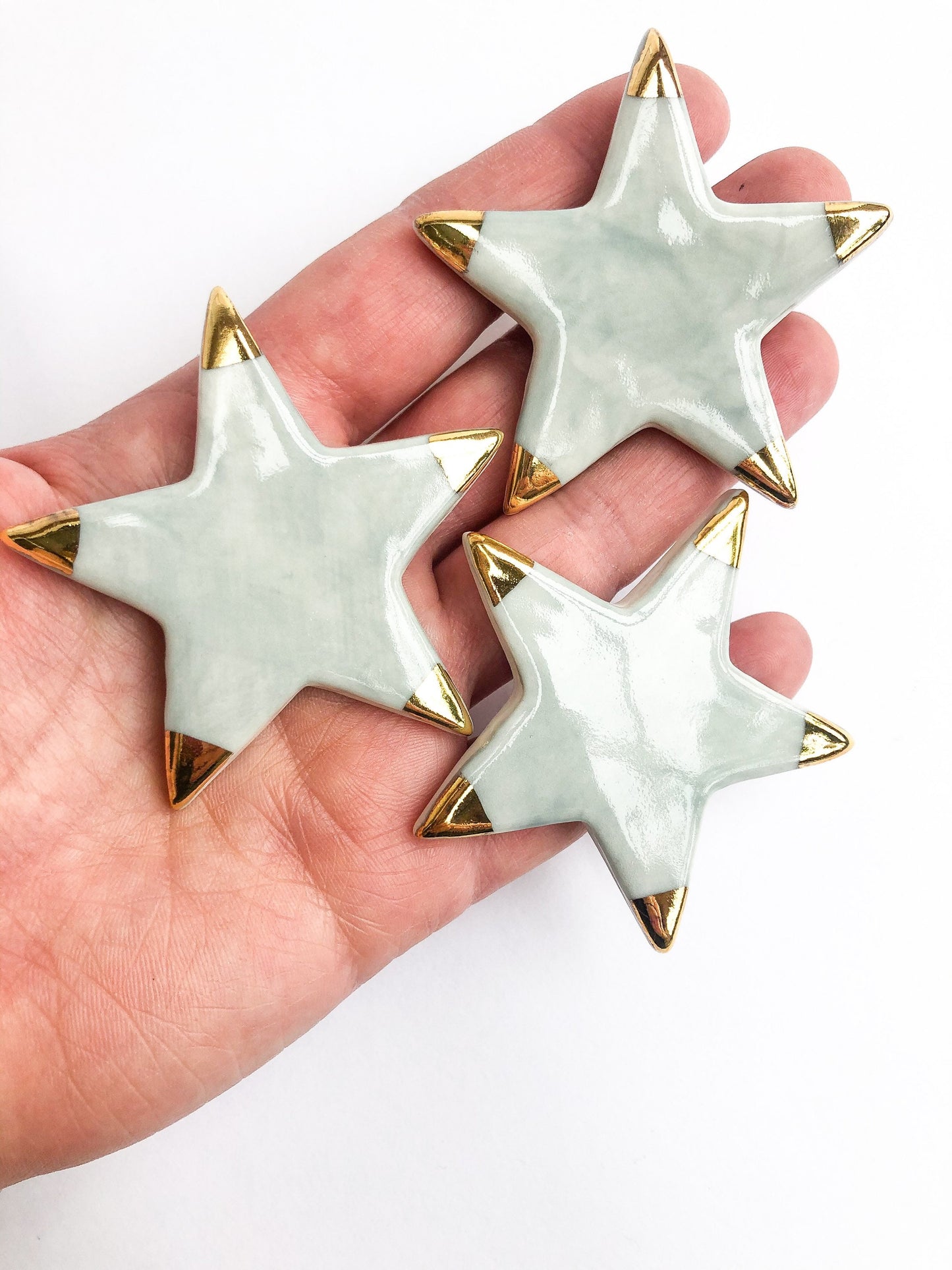 Magnet grey star with gold tips