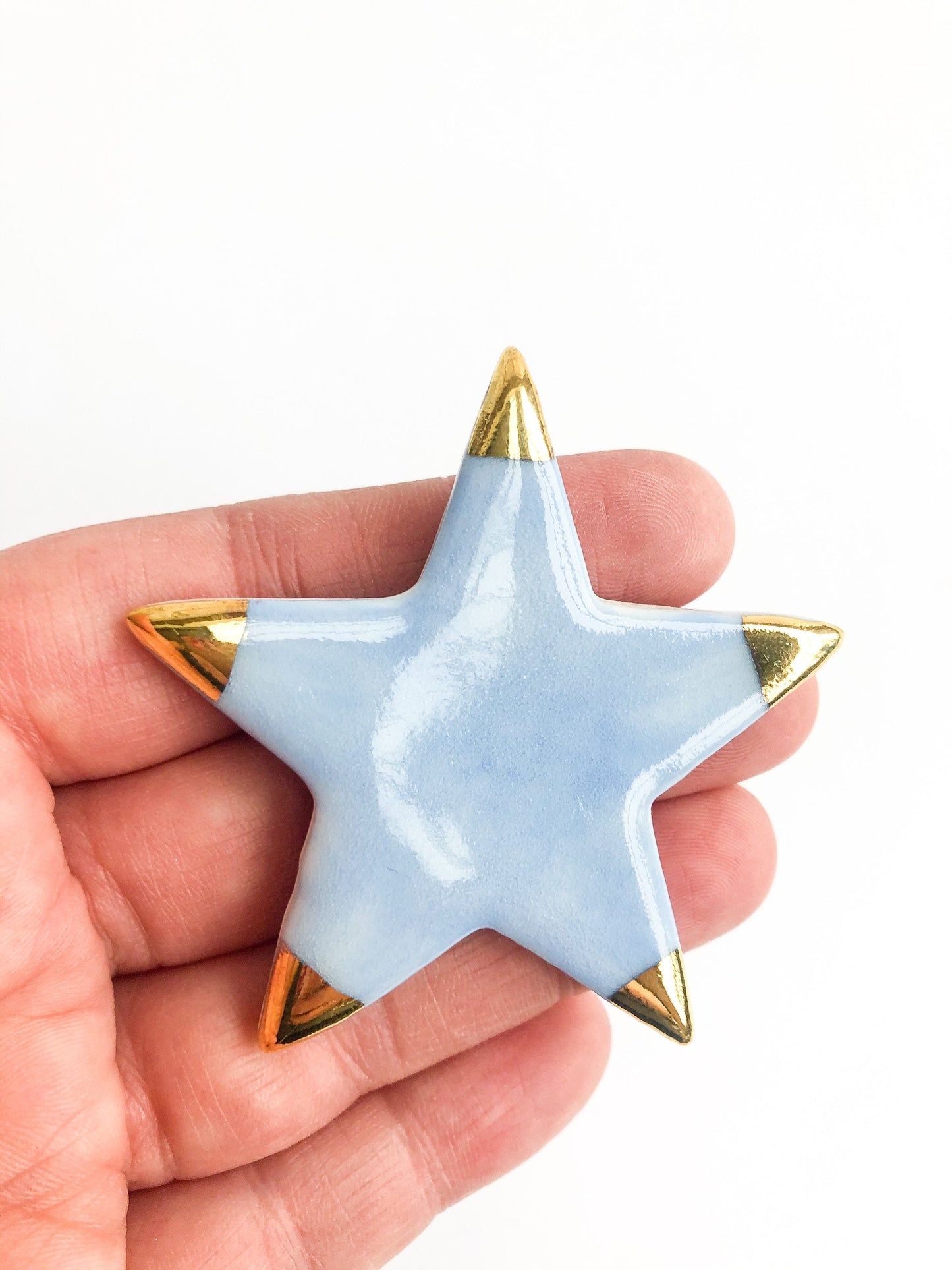 Magnet sky blue star with gold tips