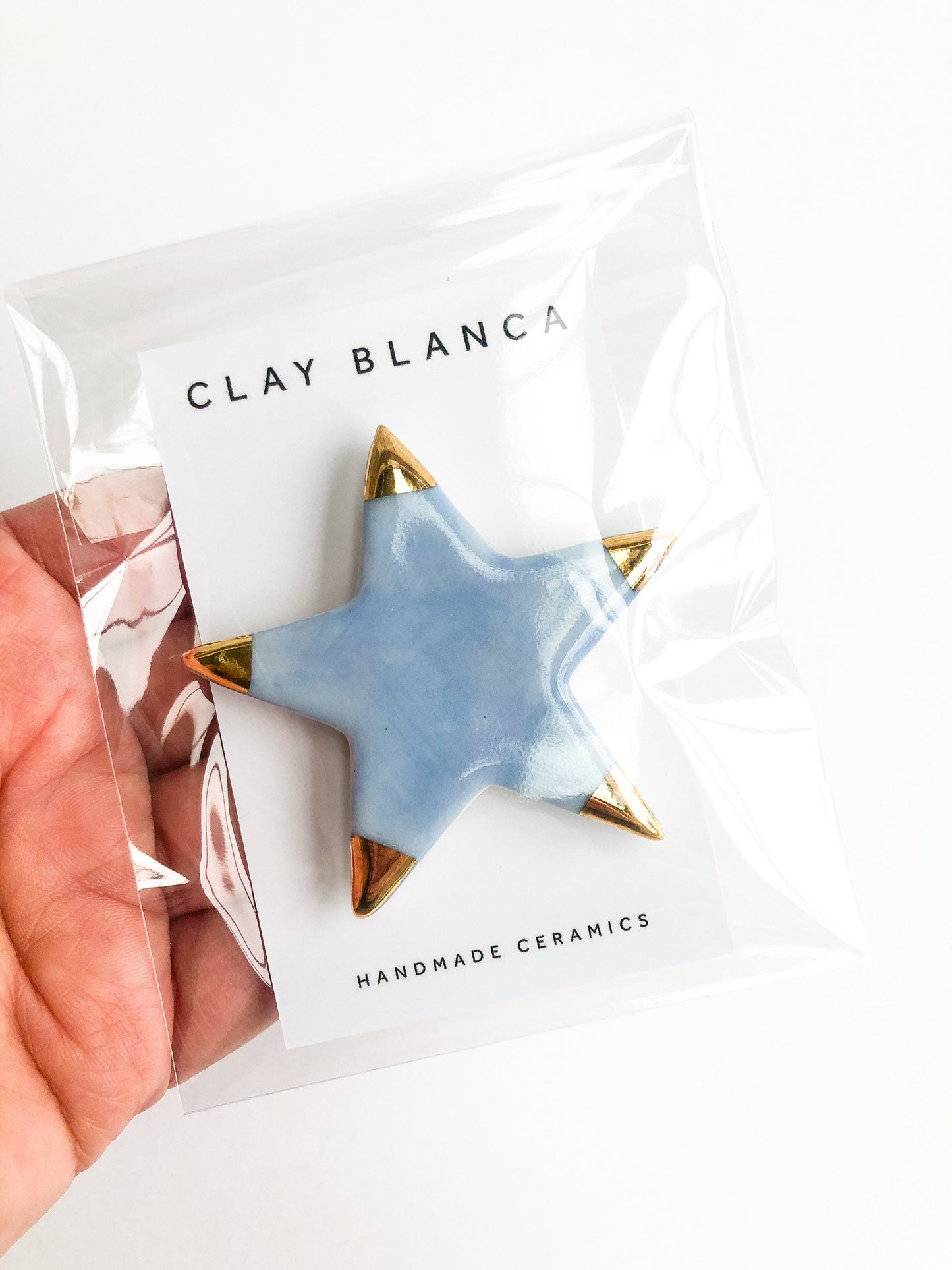 Magnet sky blue star with gold tips