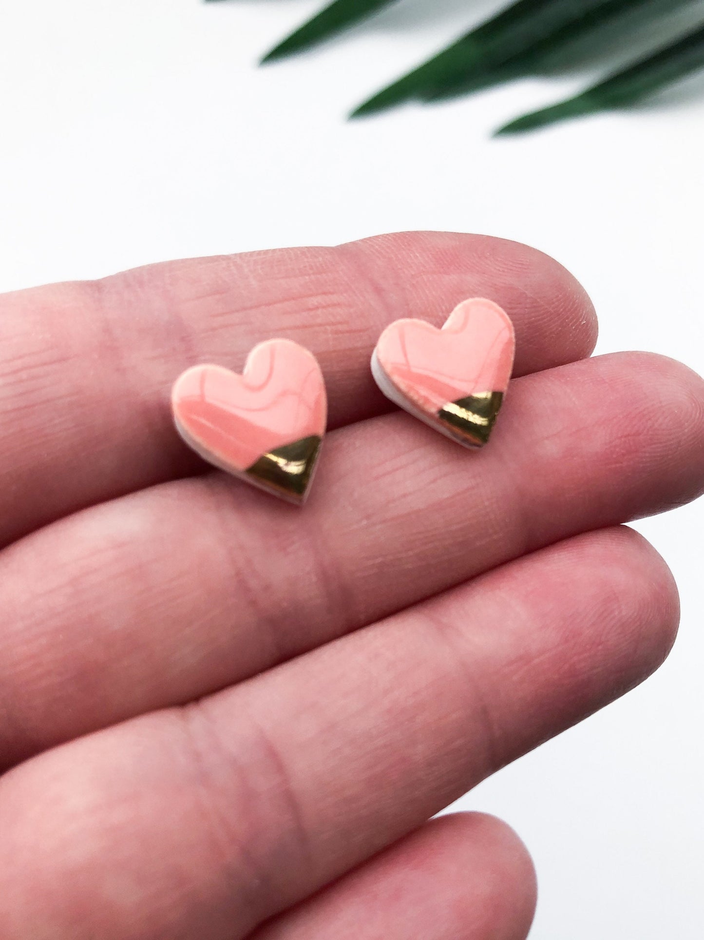 Peachy Pink heart studs with gold tips