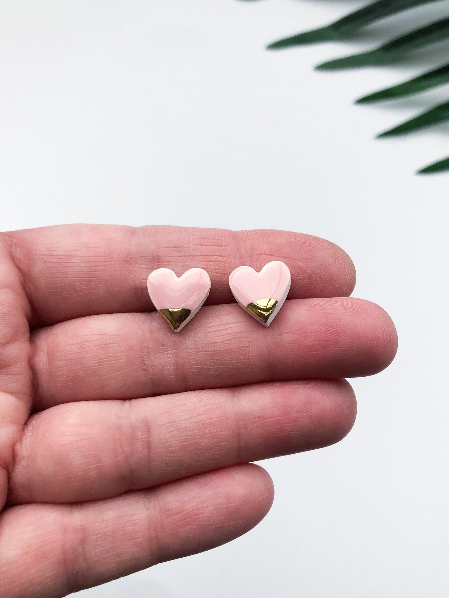 Light Pink heart studs with gold tip
