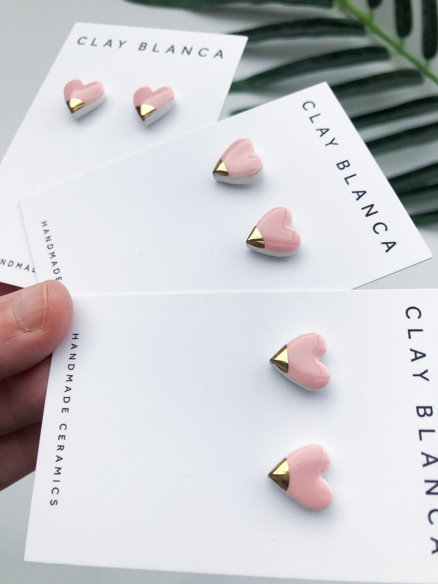 Light Pink heart studs with gold tip