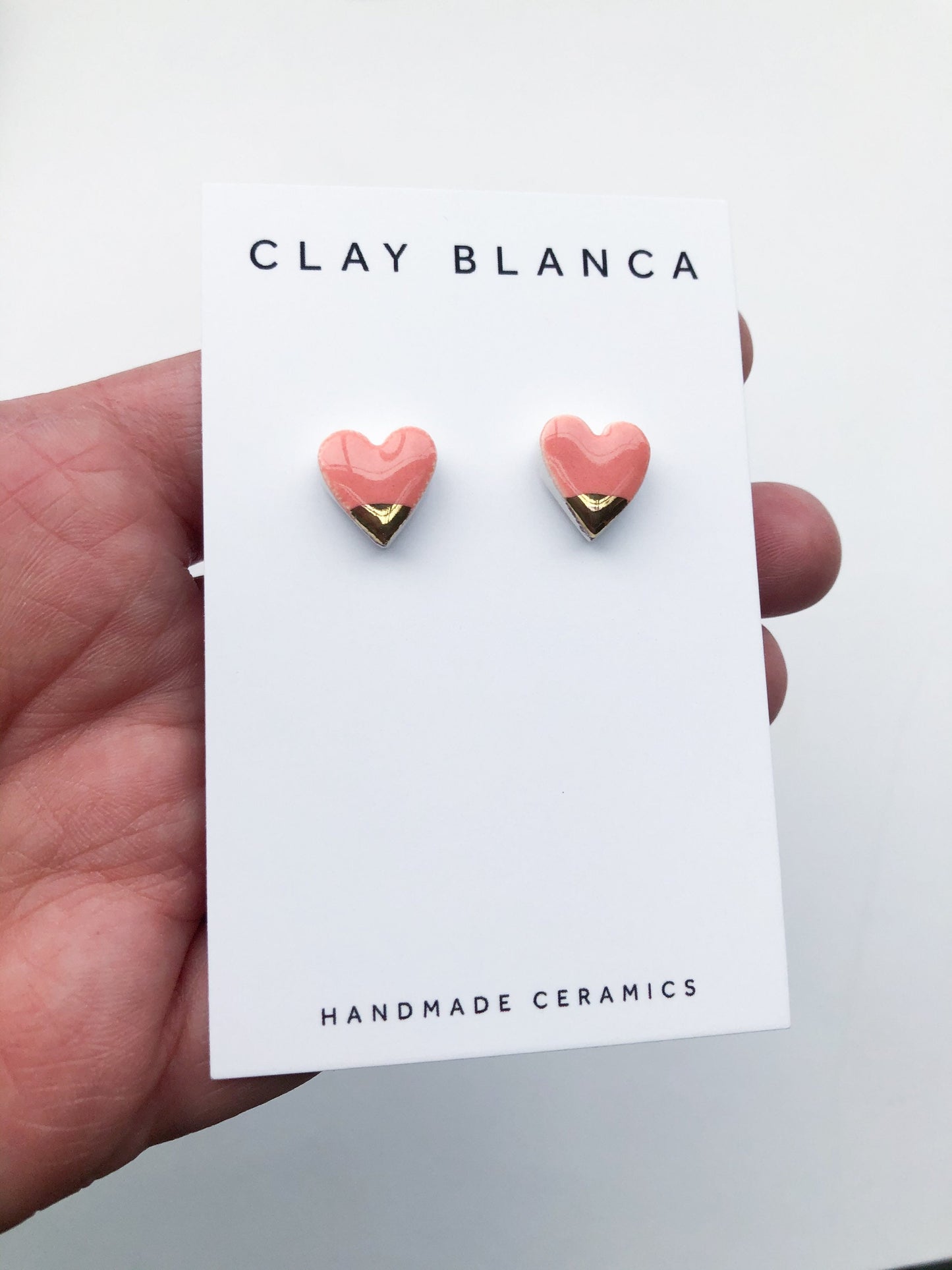 Peachy Pink heart studs with gold tips