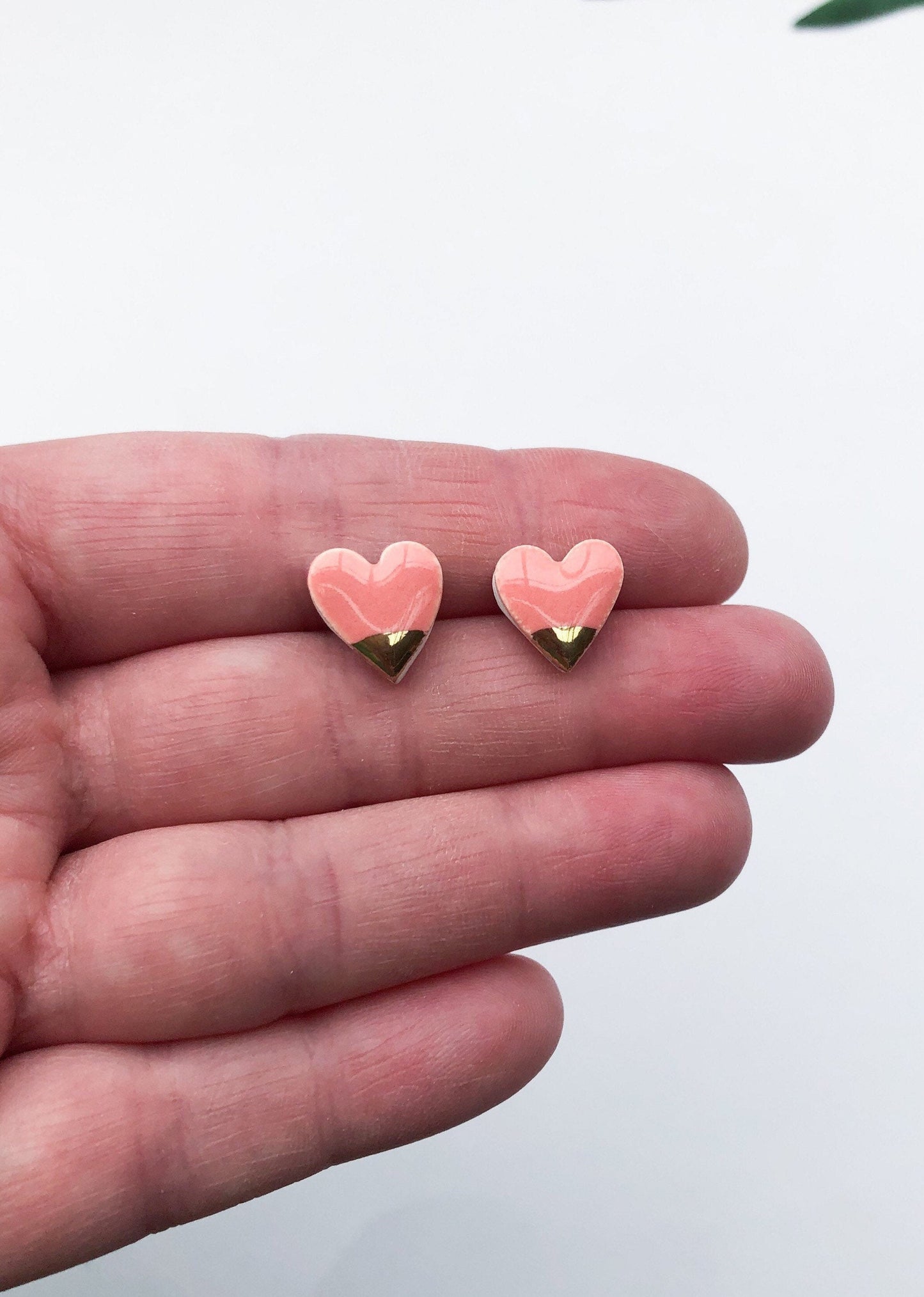 Peachy Pink heart studs with gold tips