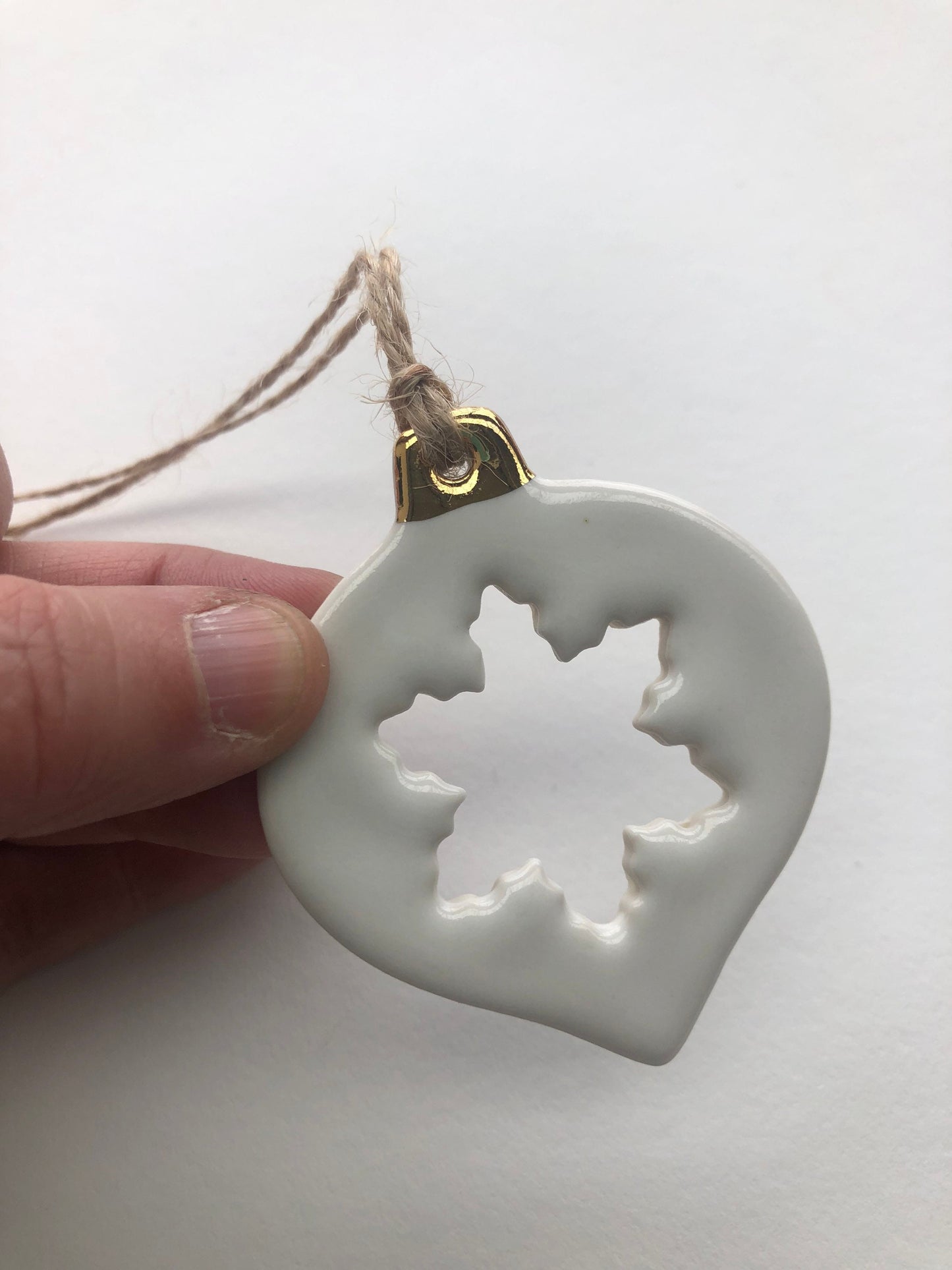 White Christmas bauble with snowflake cut-out ornament