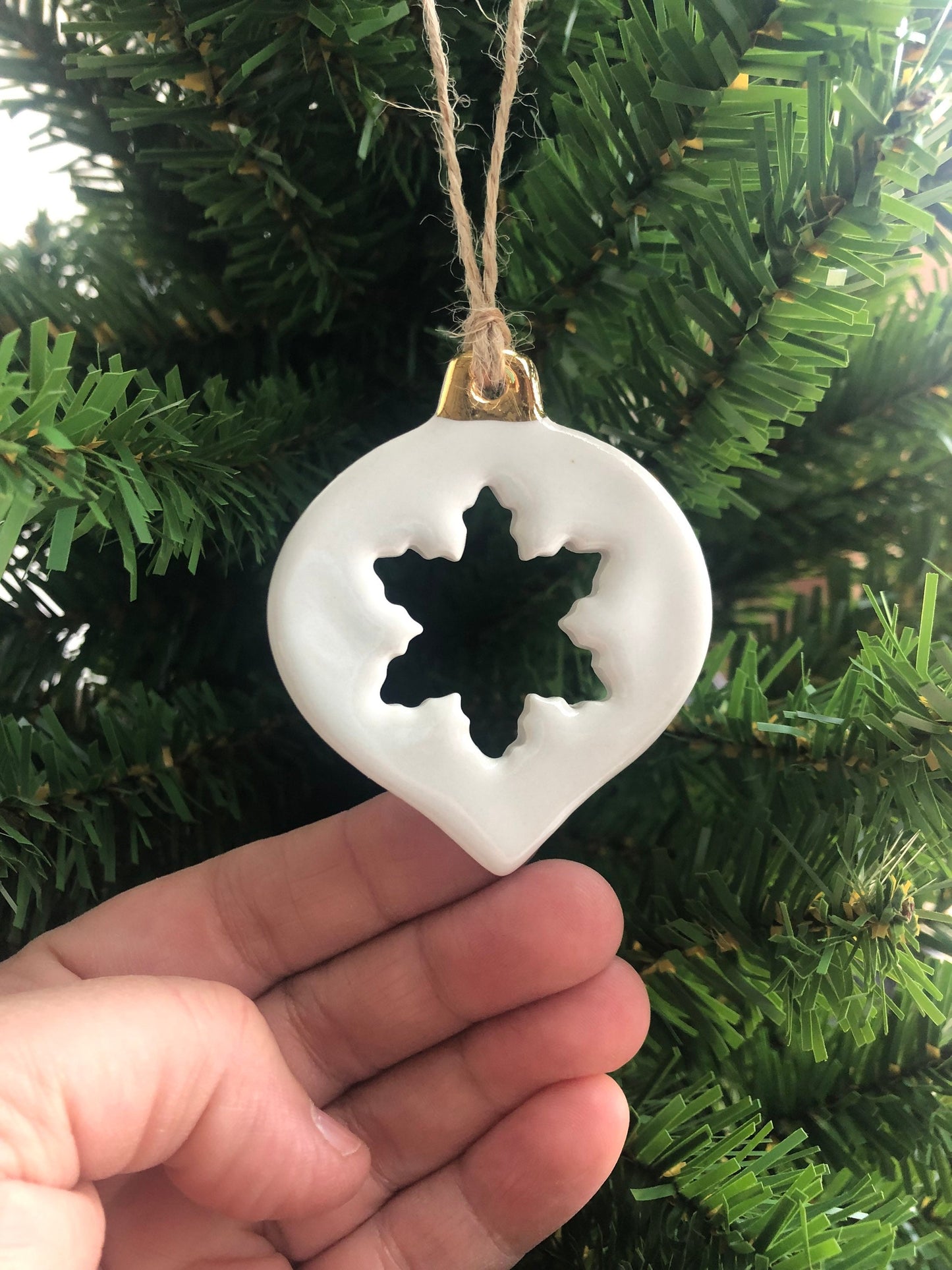 White Christmas bauble with snowflake cut-out ornament