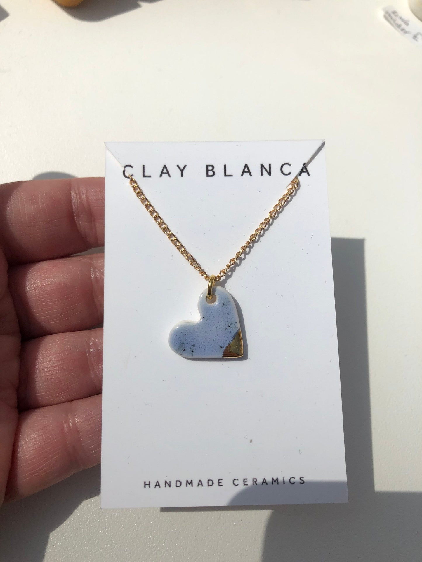 Speckled Purple small heart necklace with gold tip