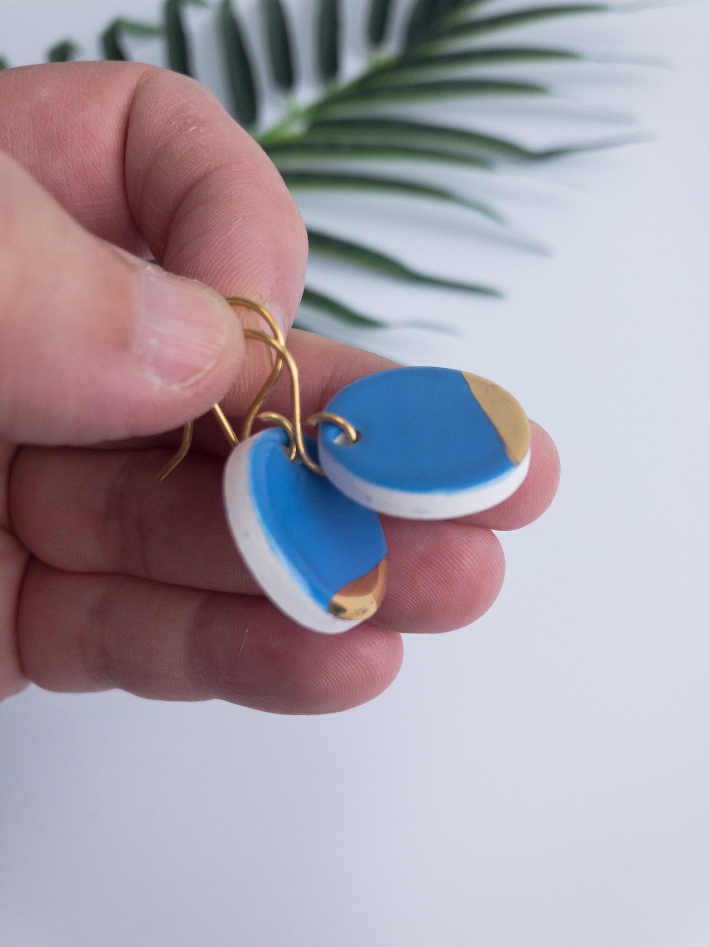 Carolina blue round dangles with gold tips