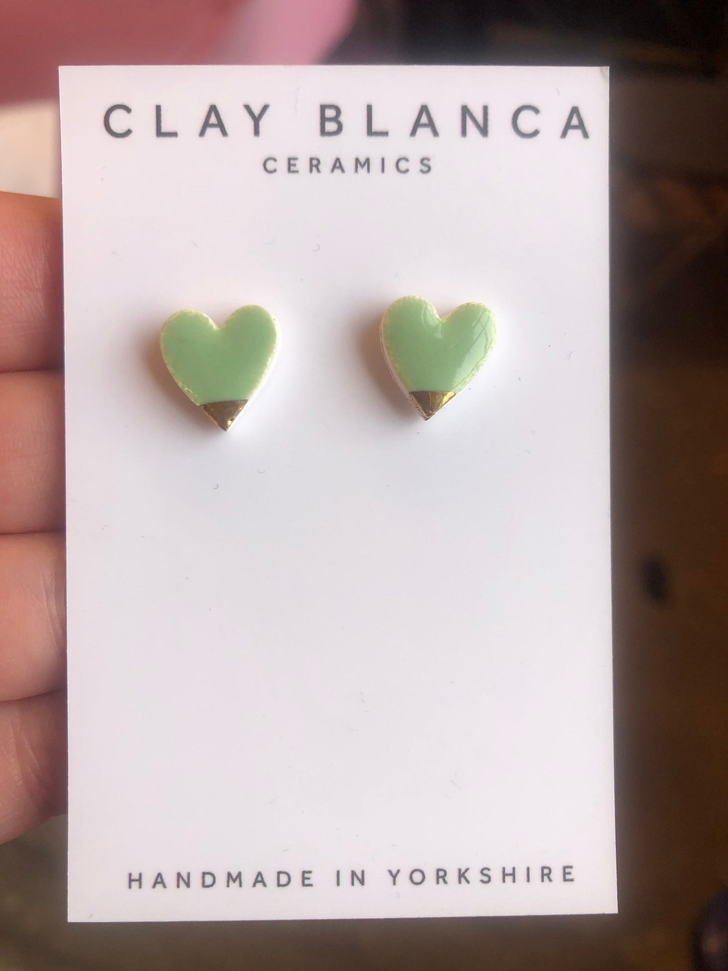 Light Green heart studs with gold tips