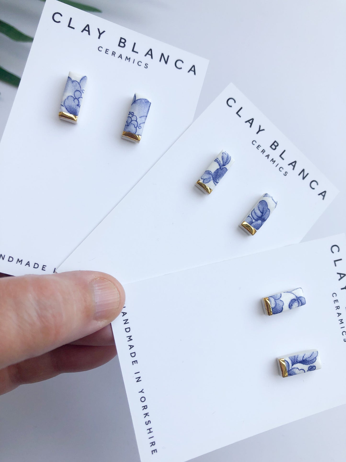 Vintage china - small blue rectangle studs with gold tips