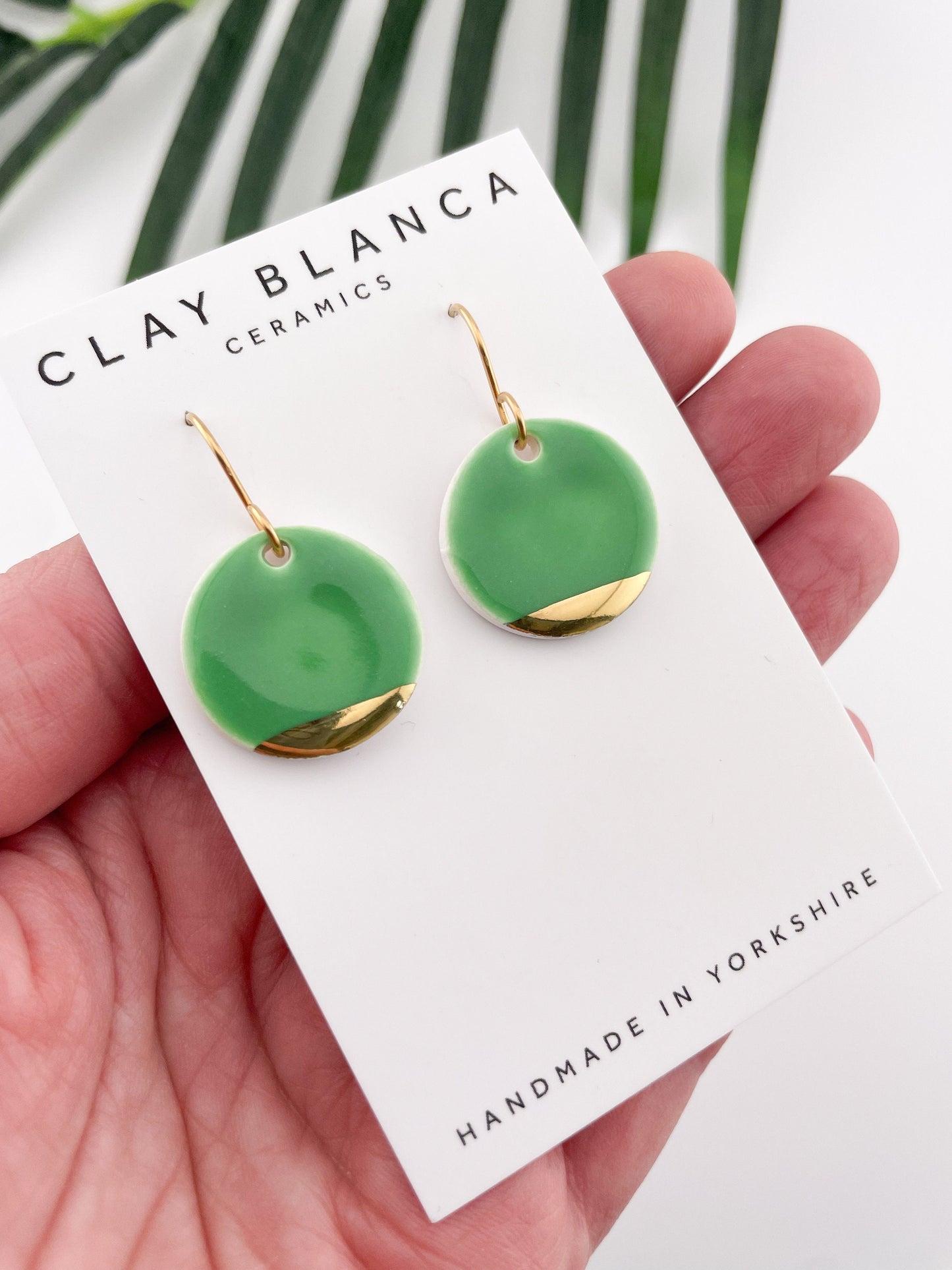 Betty green round with gold tips dangles