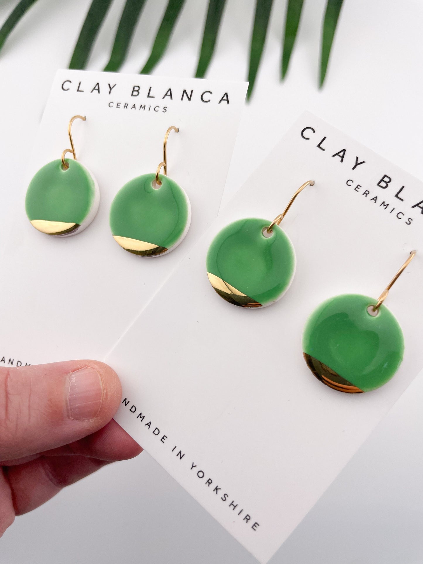 Betty green round with gold tips dangles