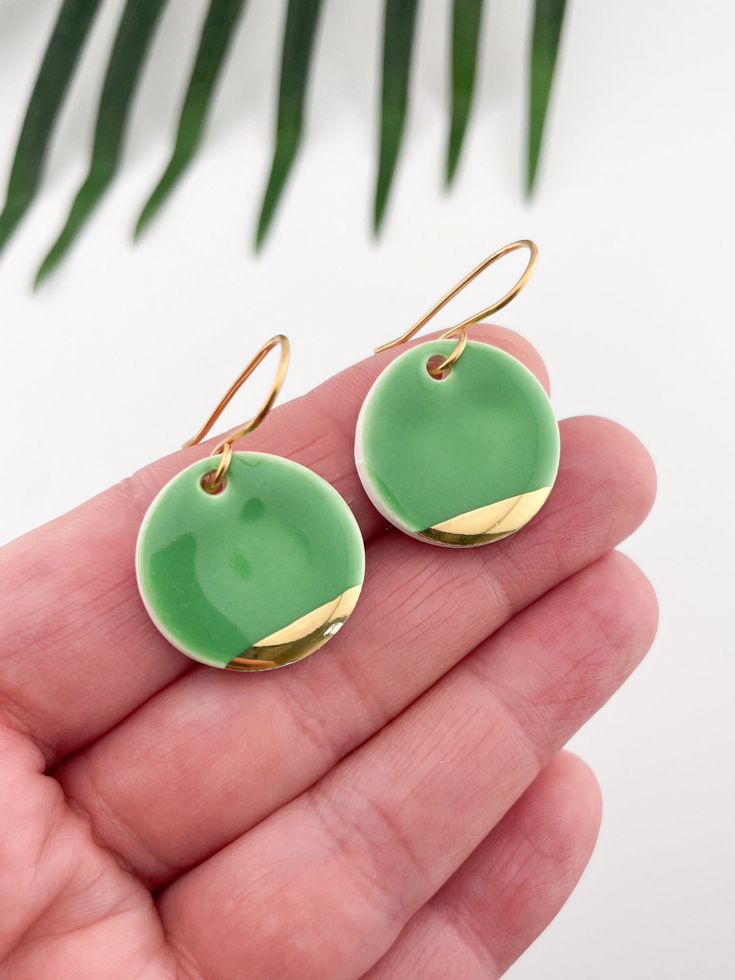 Betty green round with gold tips dangles