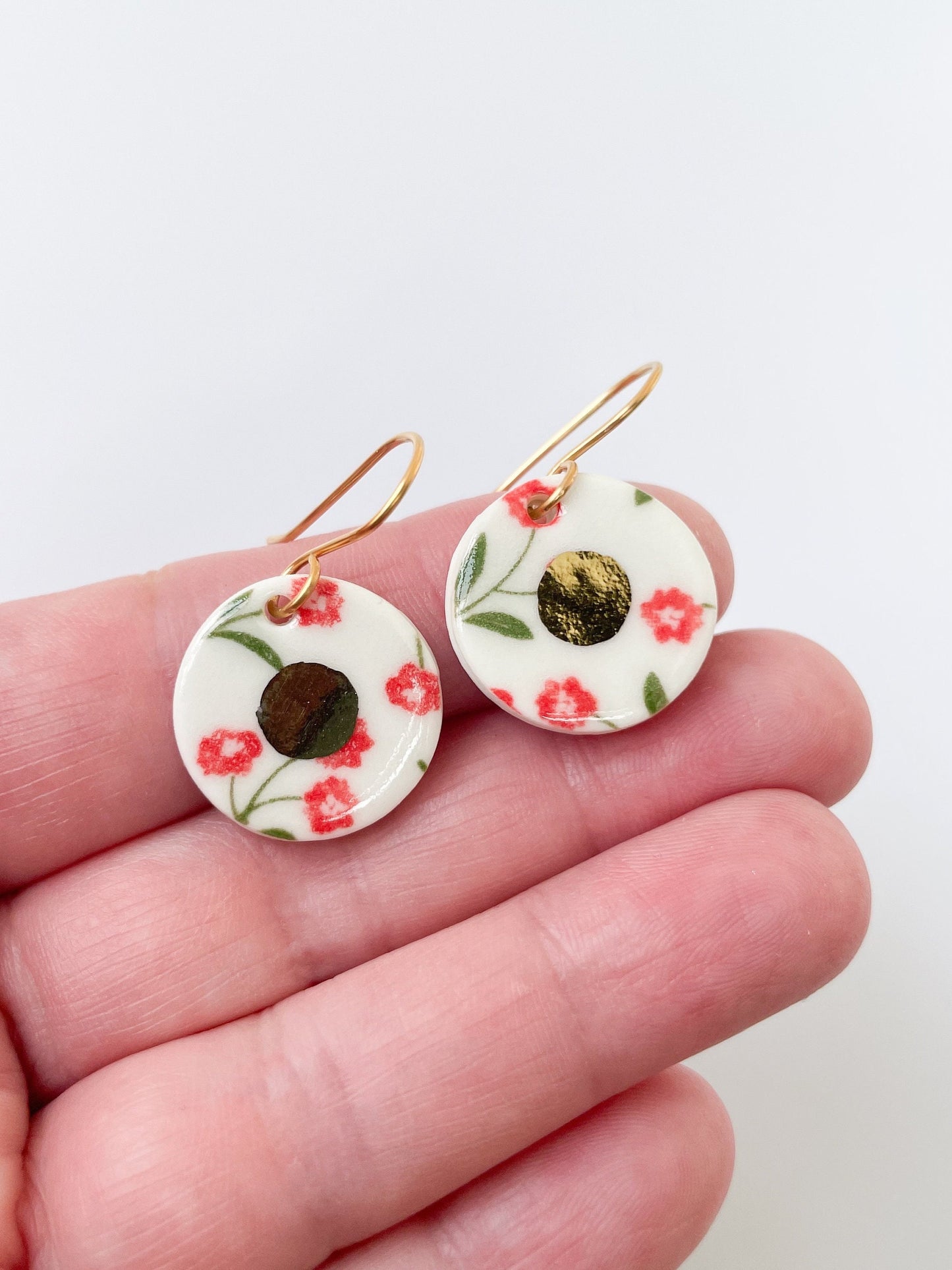 White and red flower pattern with gold centre dangles