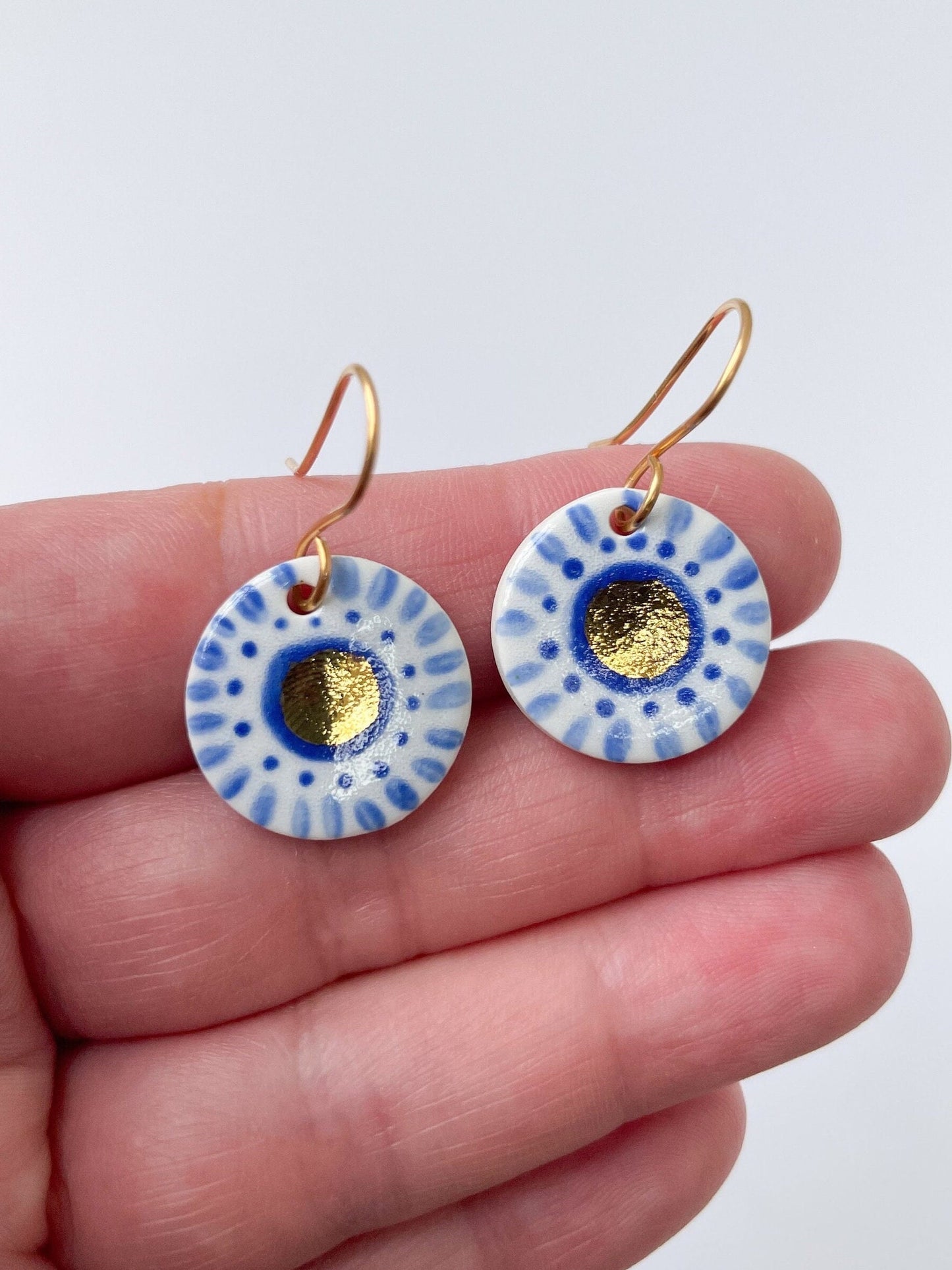 Hand painted blue and white with gold lustre dangles