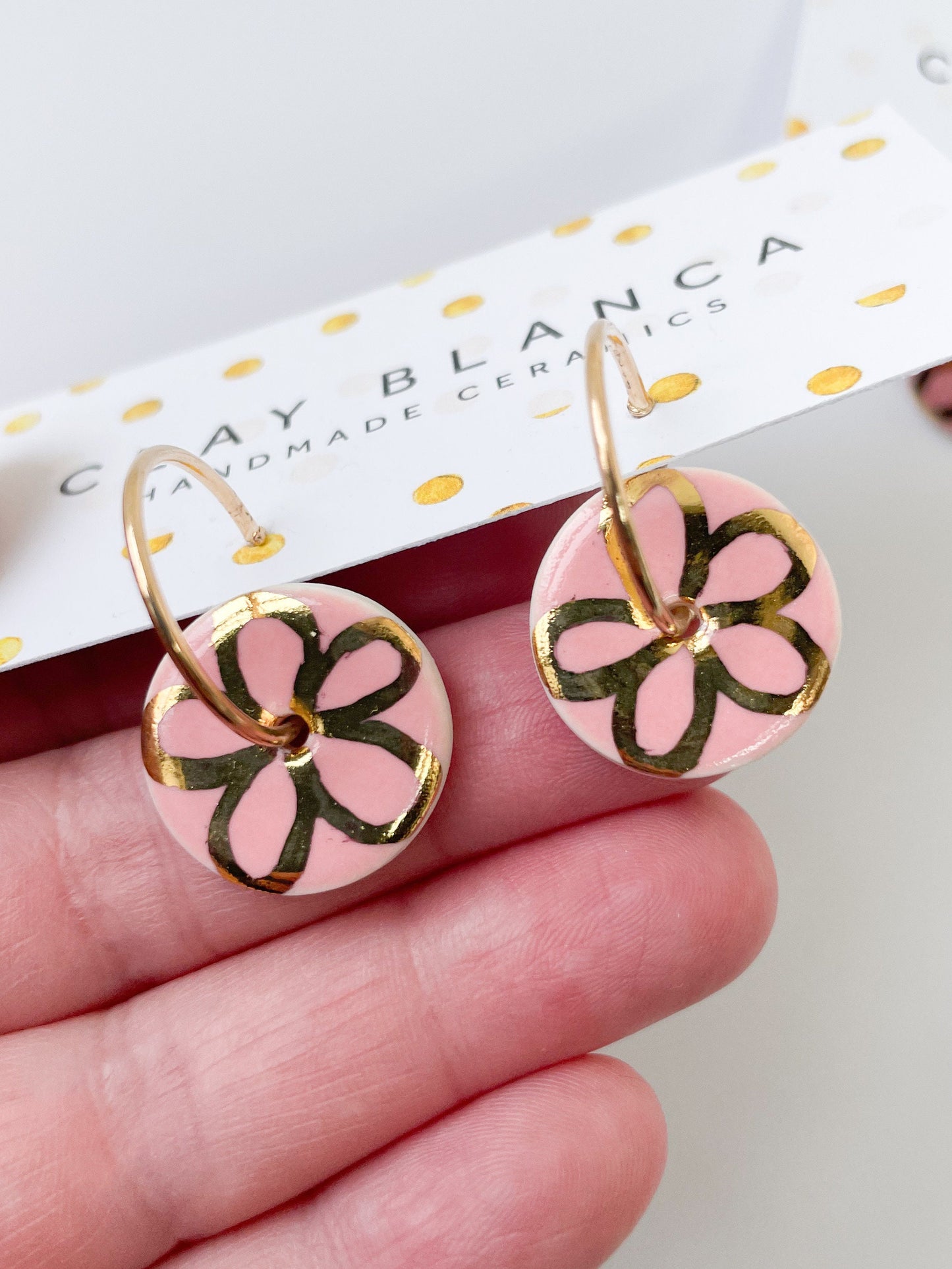 Pink with gold flower design on large hoops