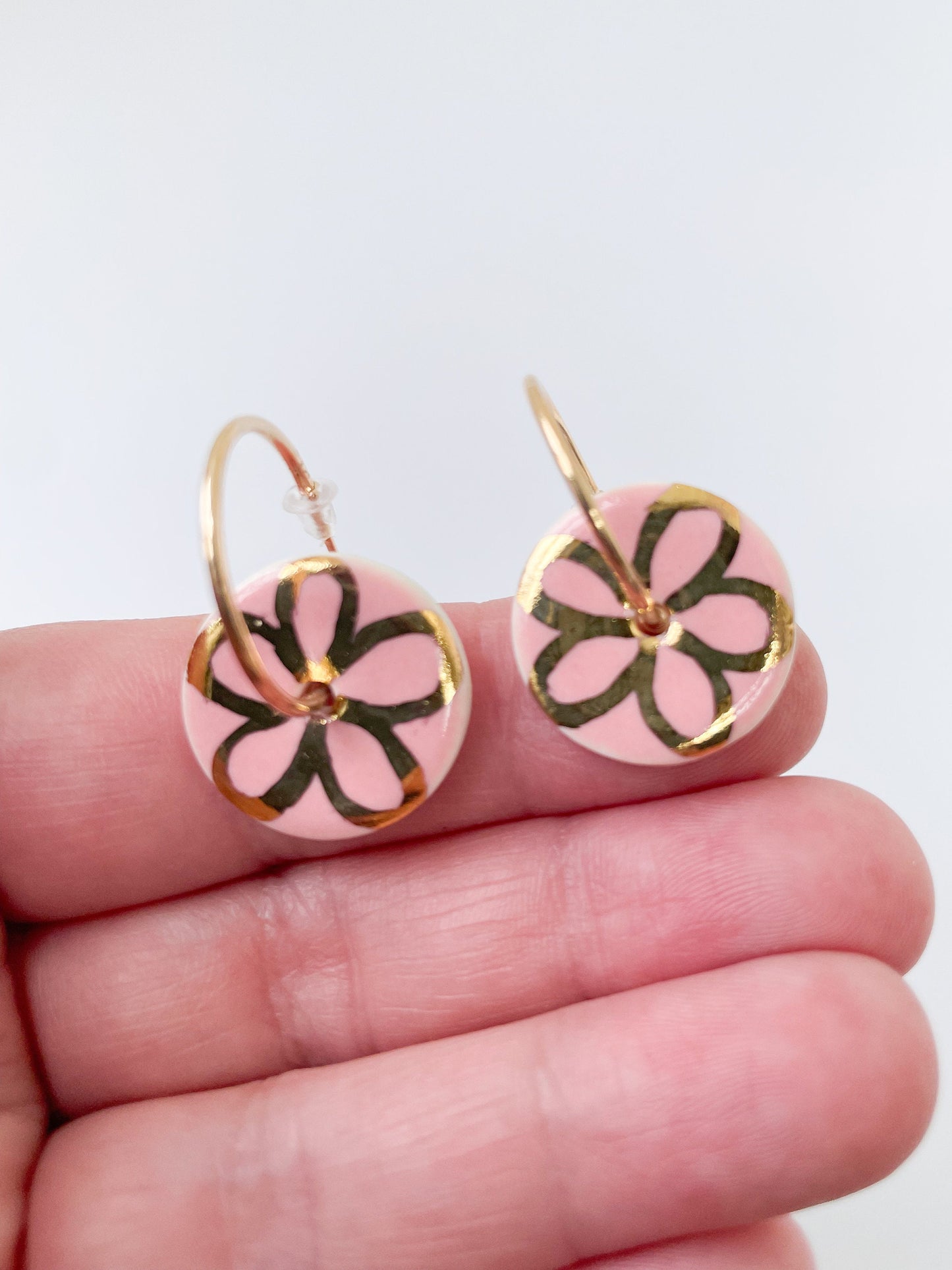 Pink with gold flower design on large hoops
