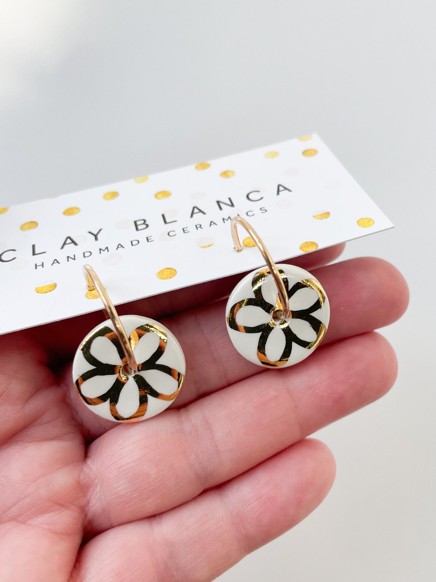 White with gold flower design on large hoops