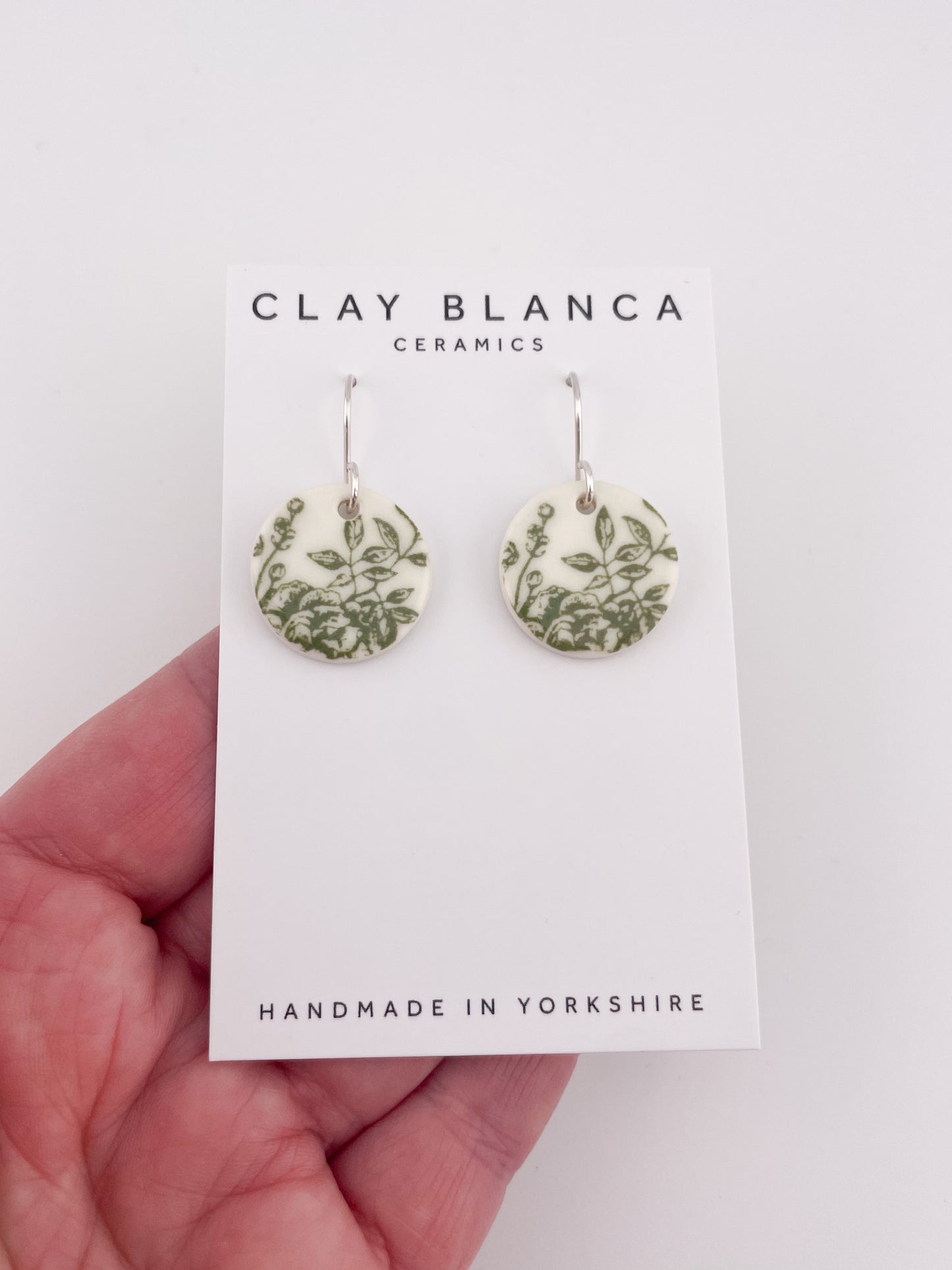 Green China round earrings
