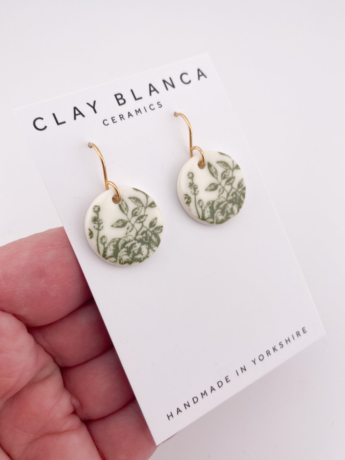 Green China round earrings