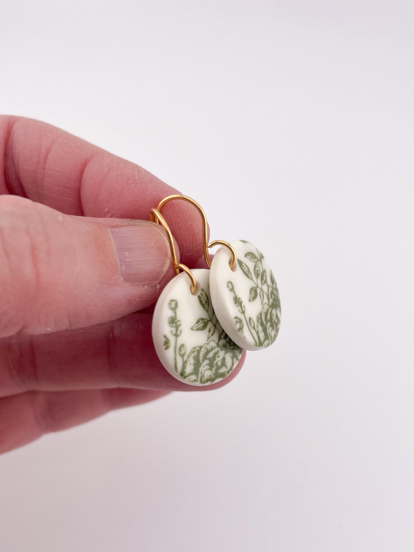 Green China round earrings