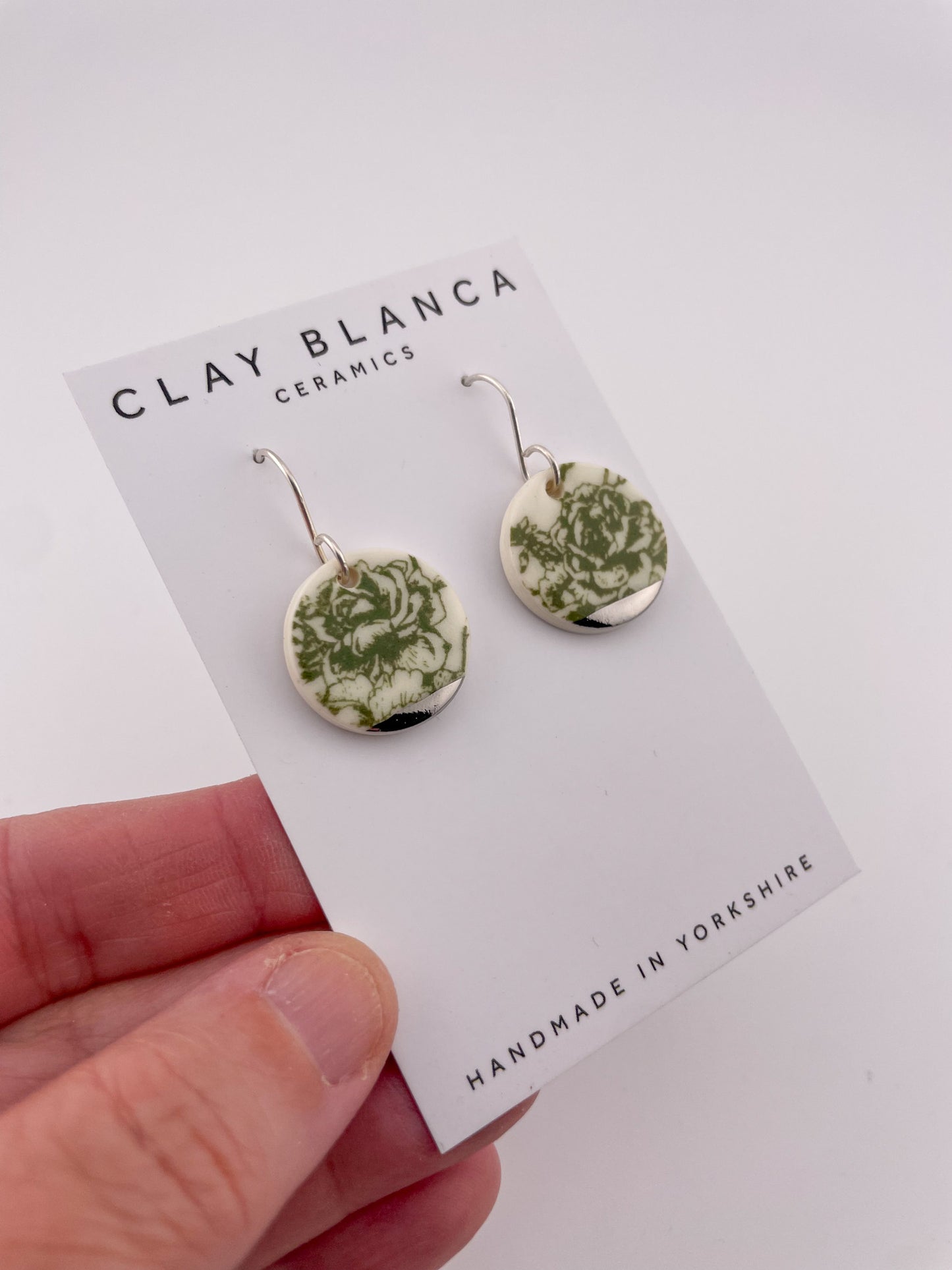 Green China round earrings