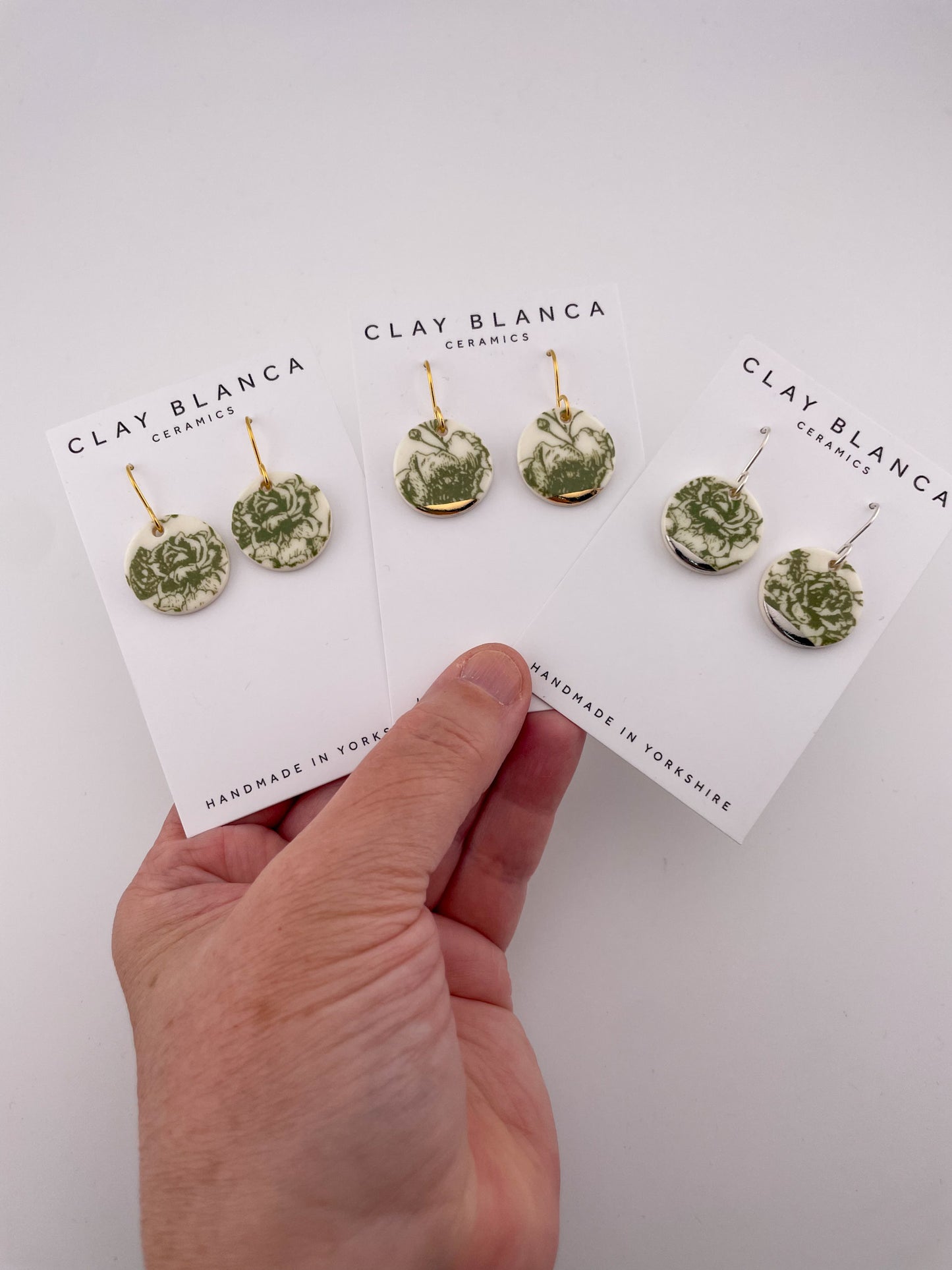 Green China round earrings