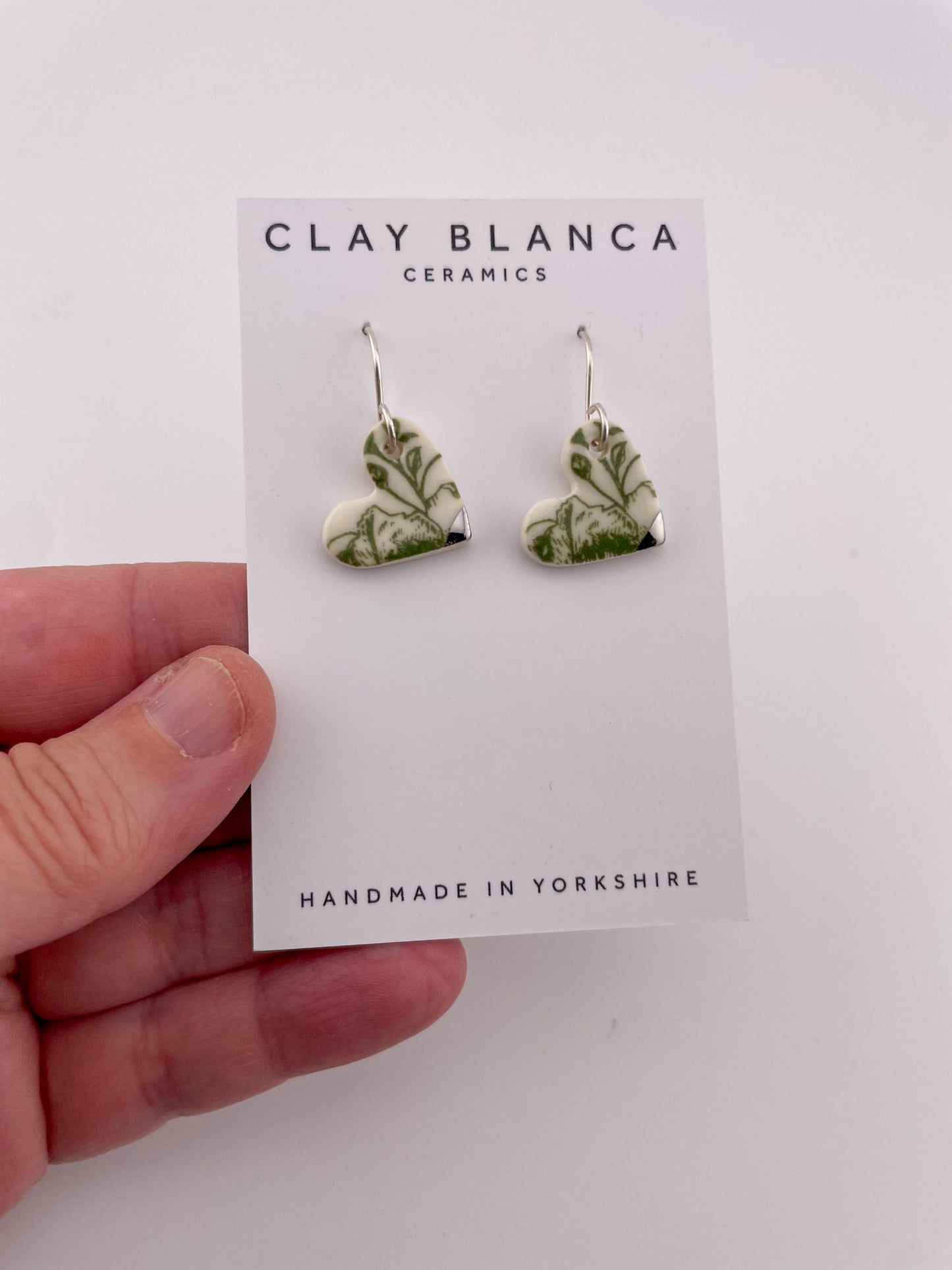 Green China heart earrings (side)