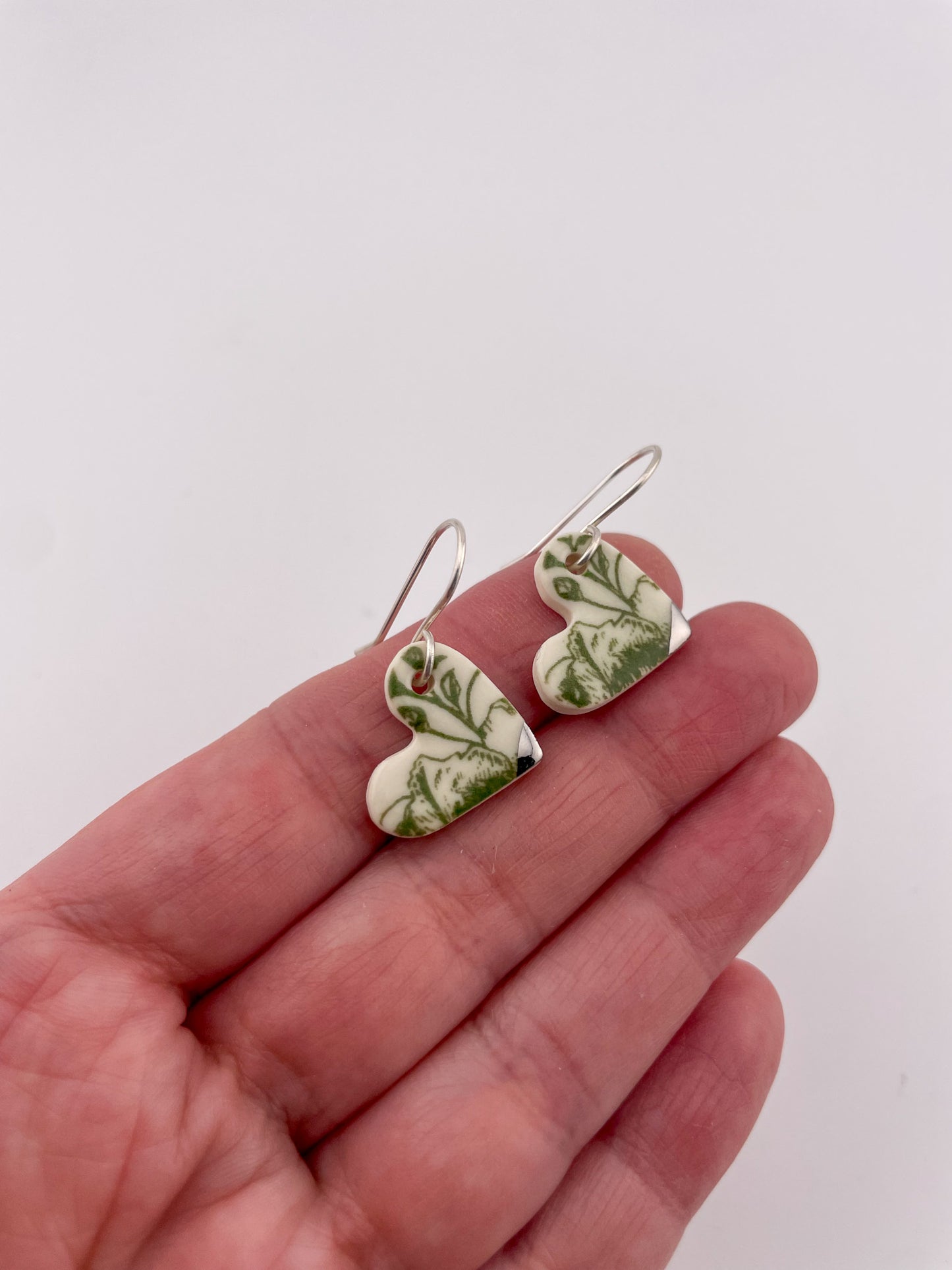 Green China heart earrings (side)