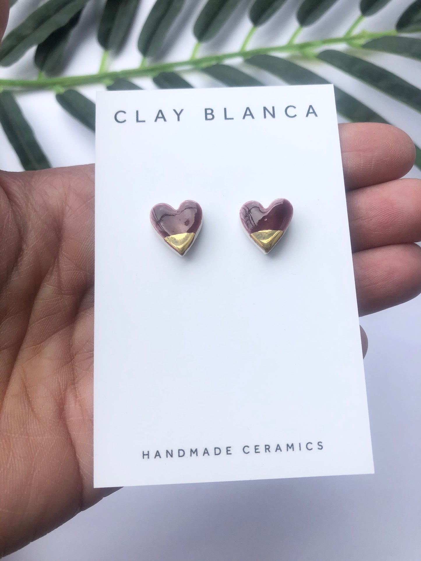 burgundy and gold heart studs