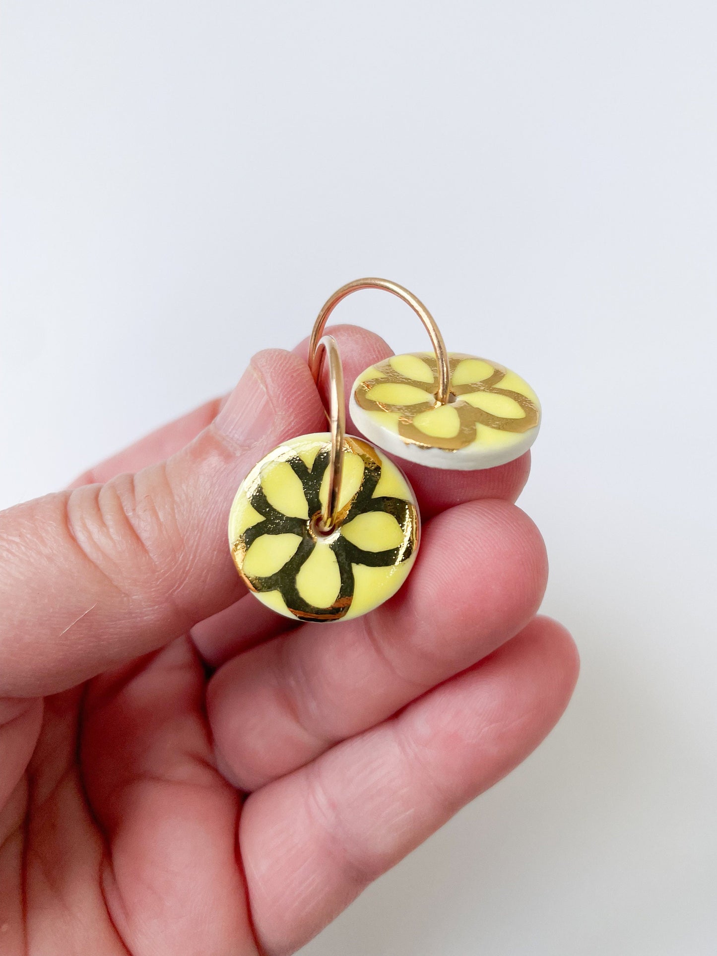 Lemon Yellow round earring with hand painted gold flower, porcelain earrings on large gold plated hoops