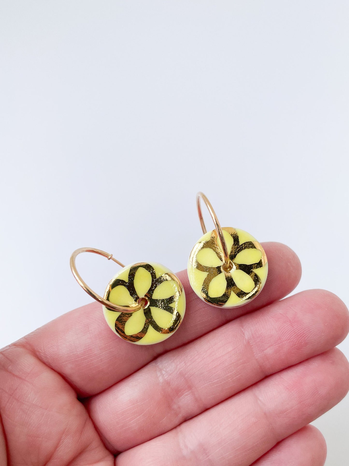 Lemon Yellow round earring with hand painted gold flower, porcelain earrings on large gold plated hoops