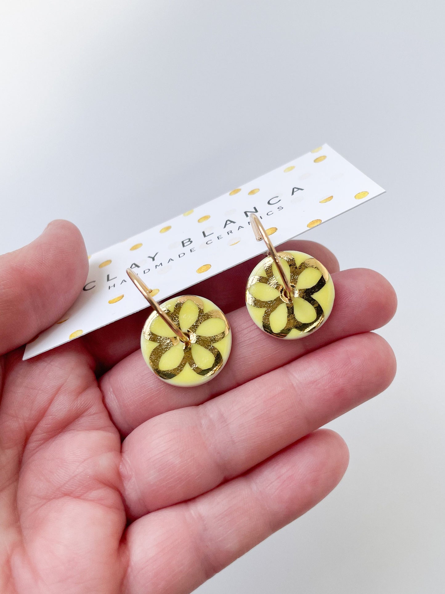 Lemon Yellow round earring with hand painted gold flower, porcelain earrings on large gold plated hoops